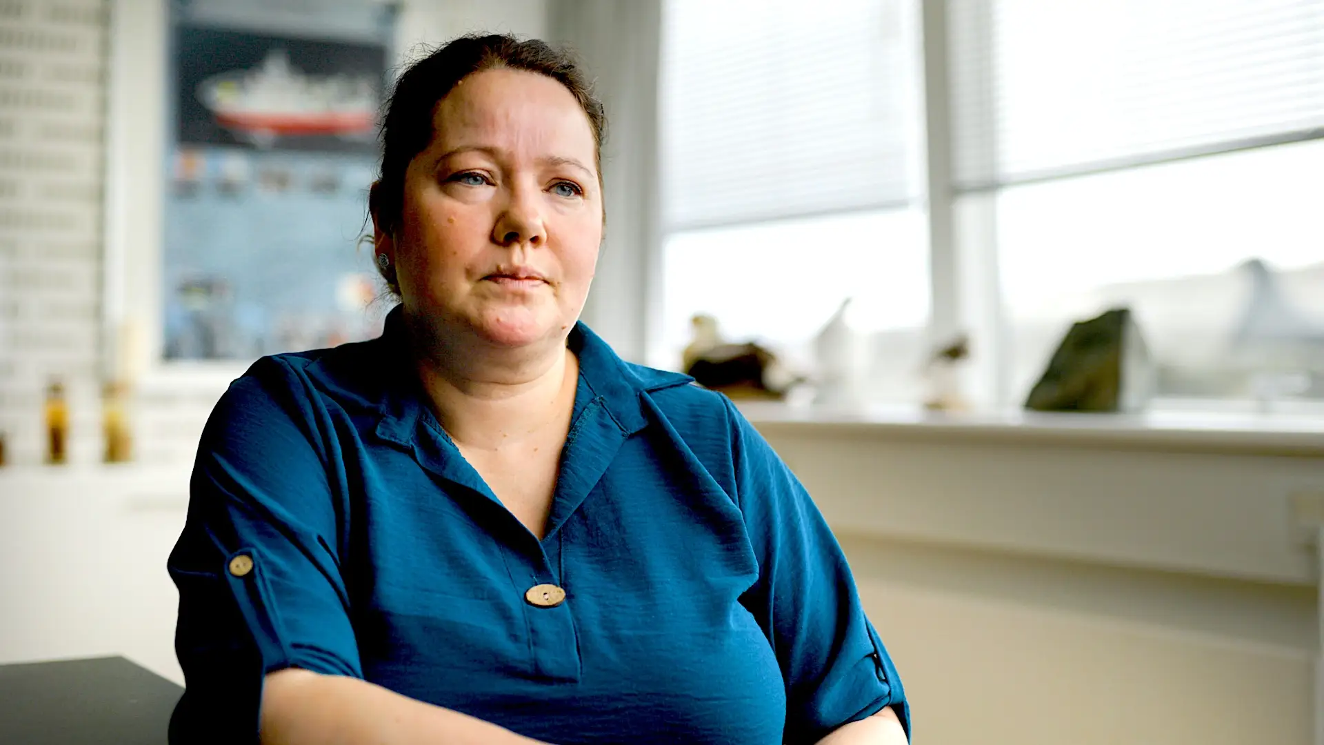 Majken Poulsen in a blue shirt.