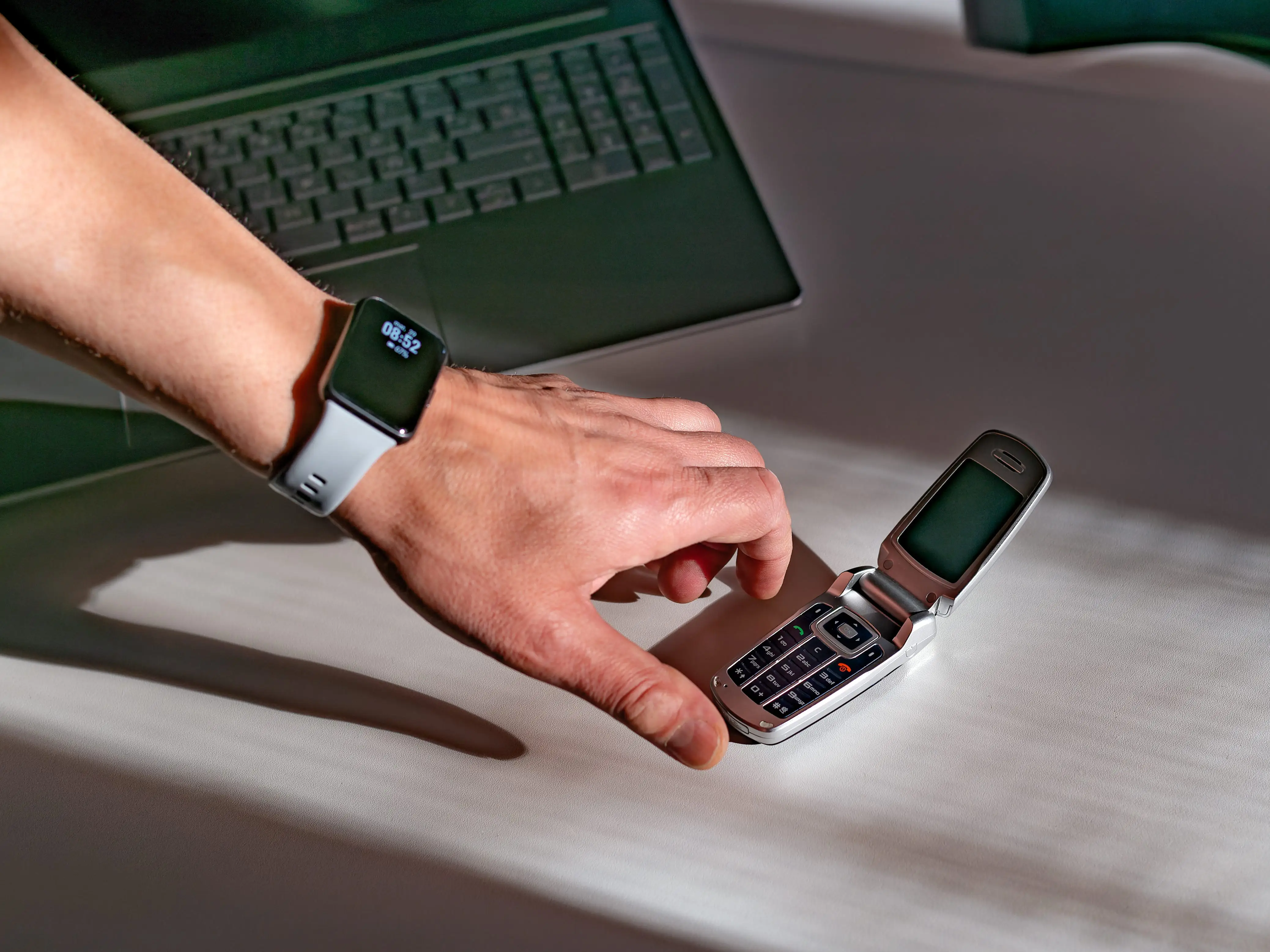 Person with flip phone