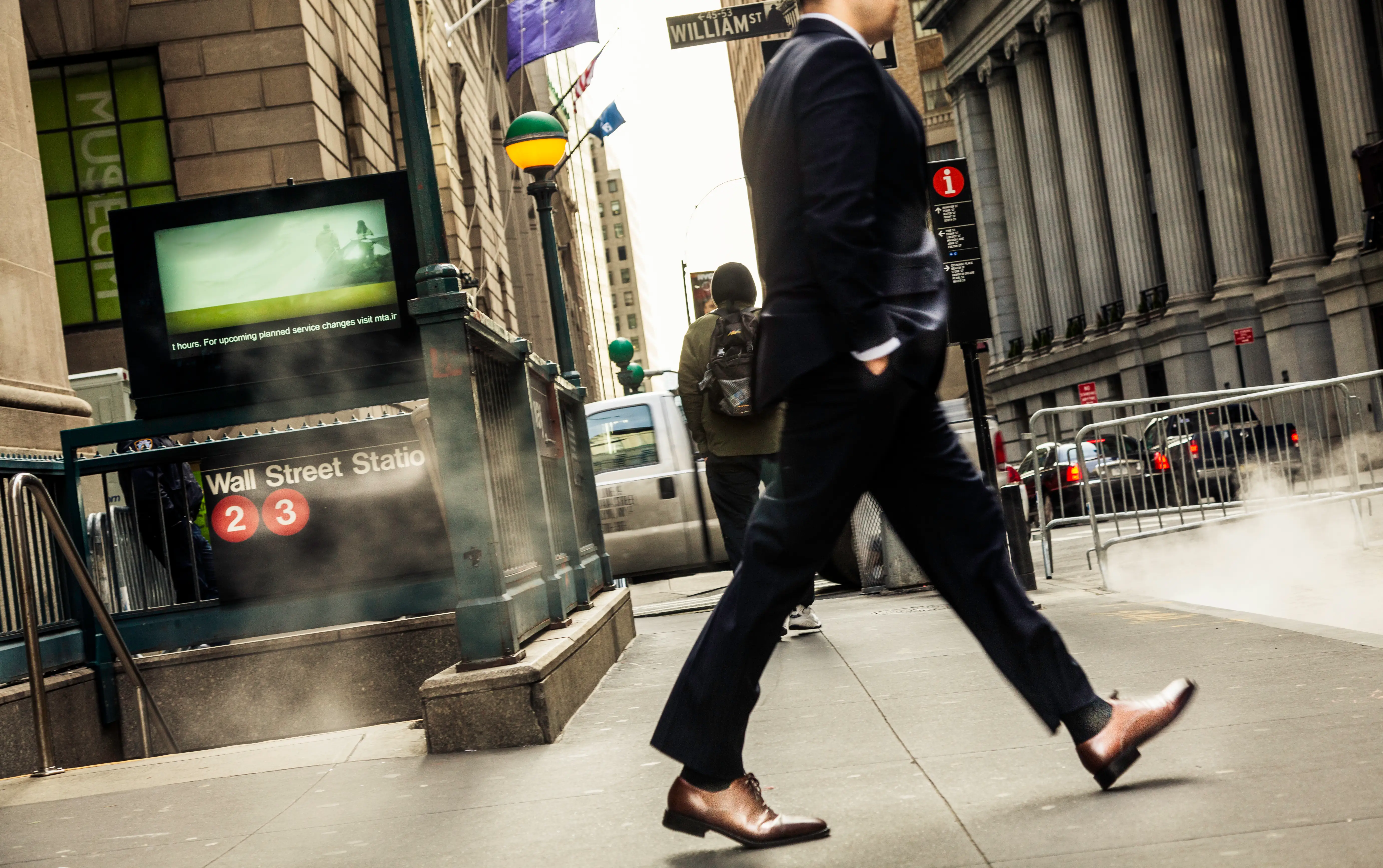Man exiting Wall Street station
