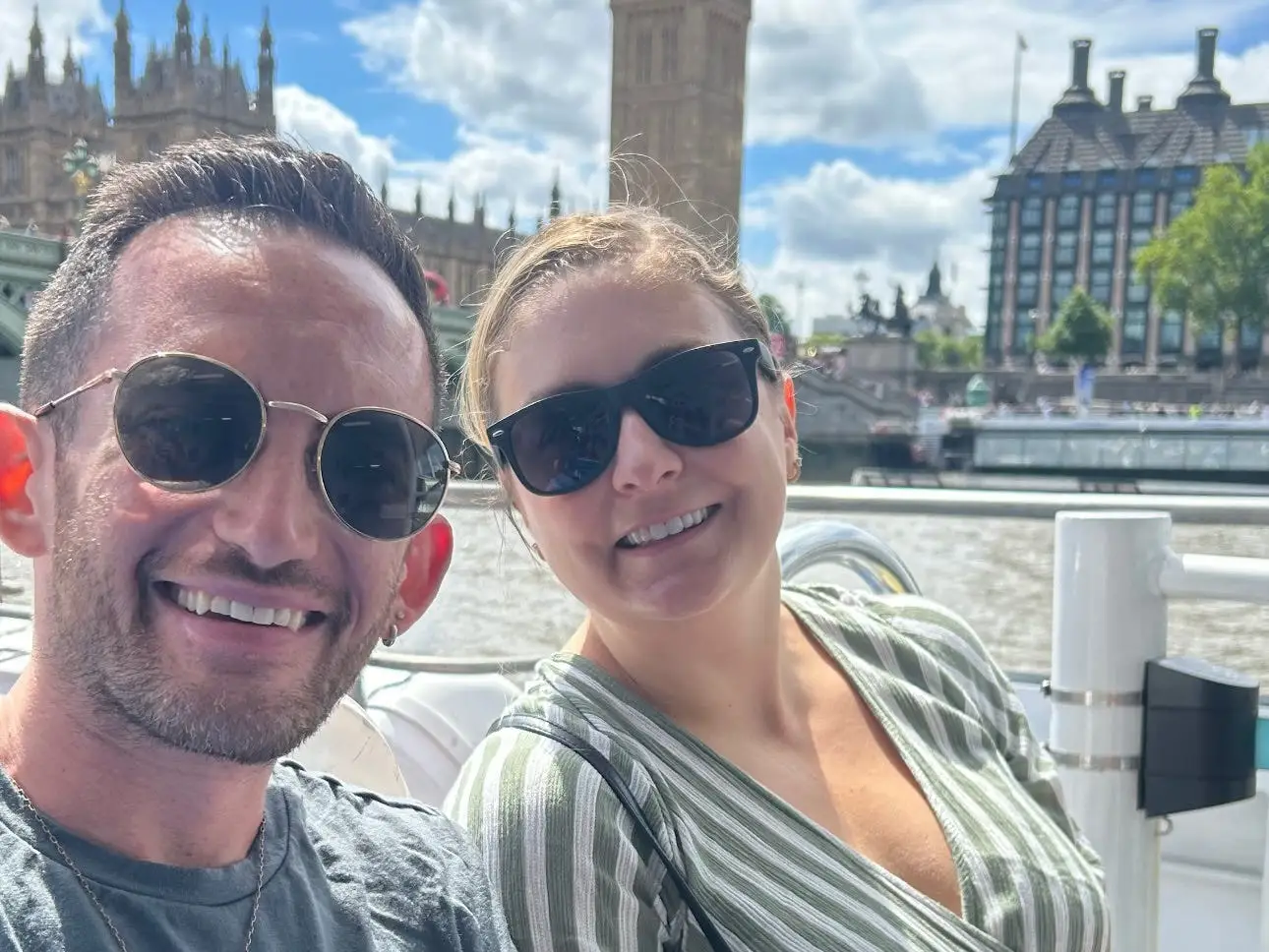 The author and his friend smiling together with Big Ben in the background.