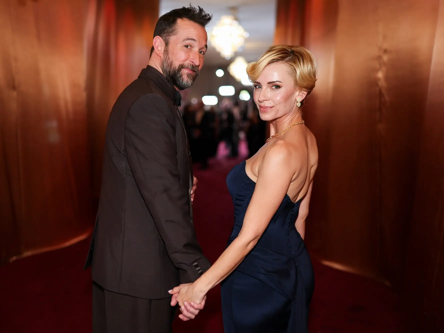 Noah Wyle and Sara Wells attend the 2026 Golden Globes.