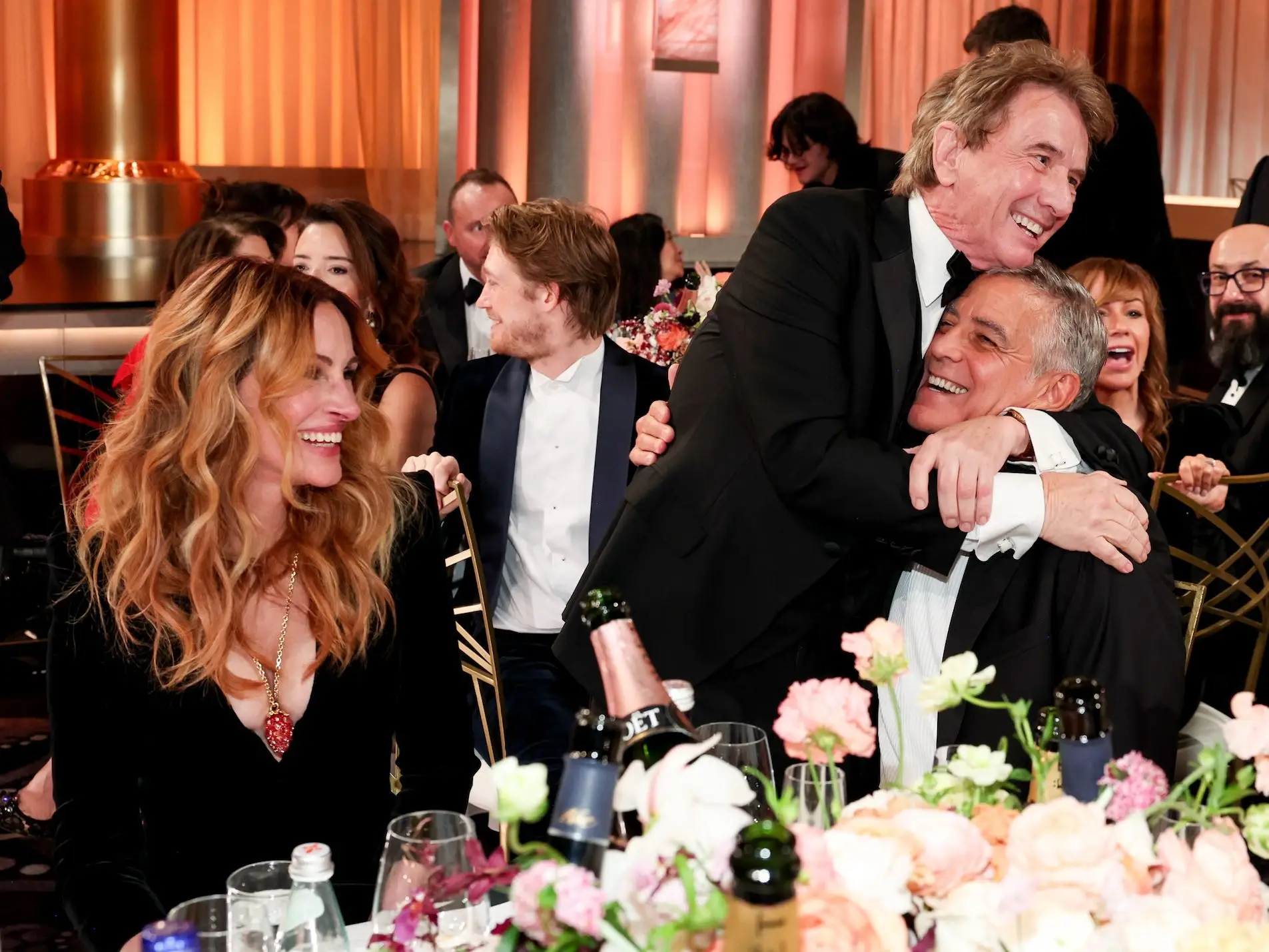 Julia Roberts, Martin Short, and George Clooney at the 2026 Golden Globes.