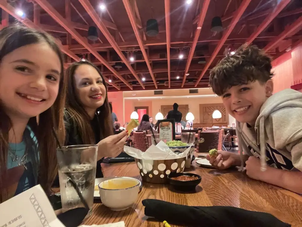 Mom with kids at restaurant