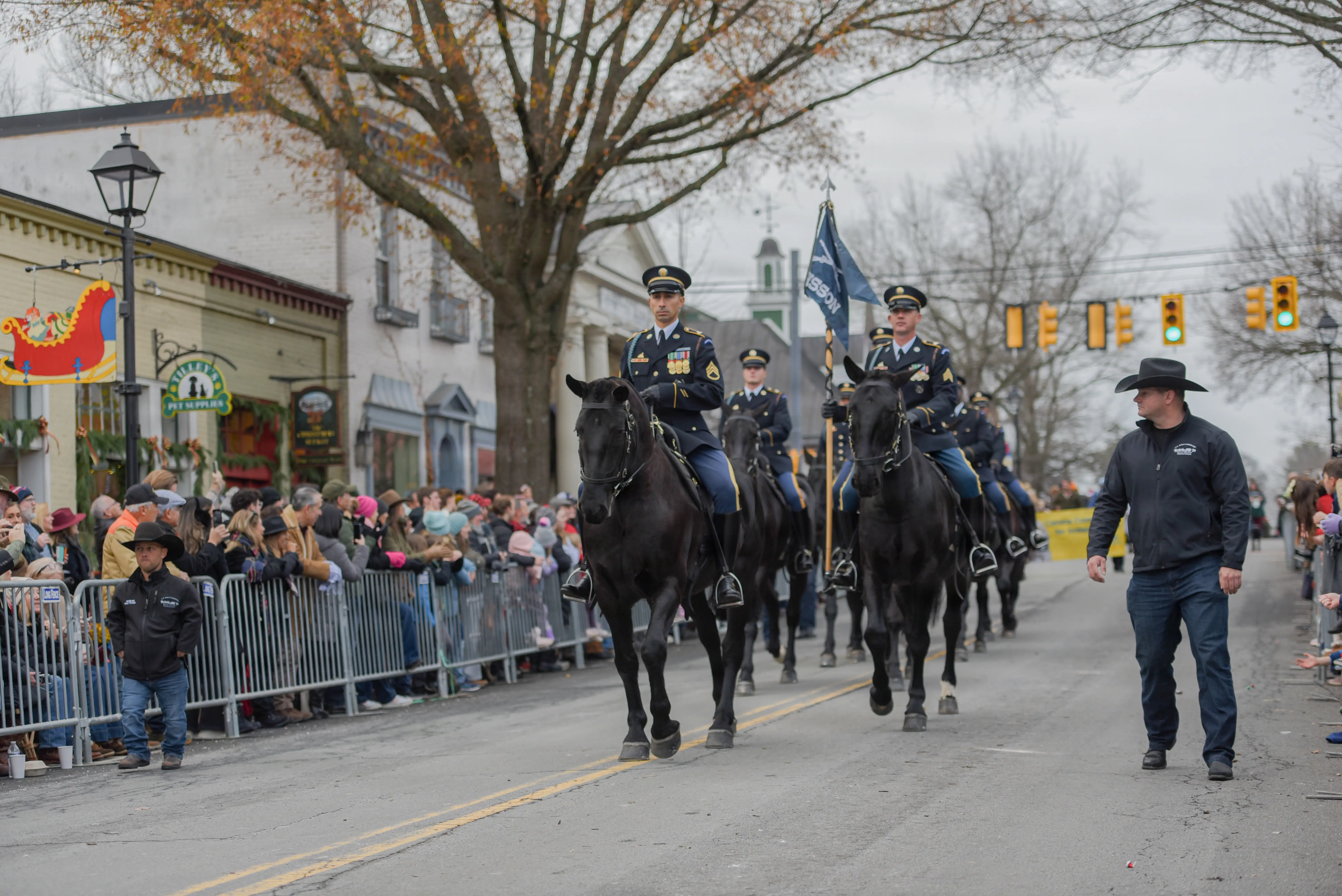 Soldiers and horses of the Army's Washington, DC-based caisson detachment, the unit which performs funeral ceremonies at Arlington National Cemetery, participate in the Middleburg Holiday Parade in Middleburg, Virginia, Dec. 6, 2025.