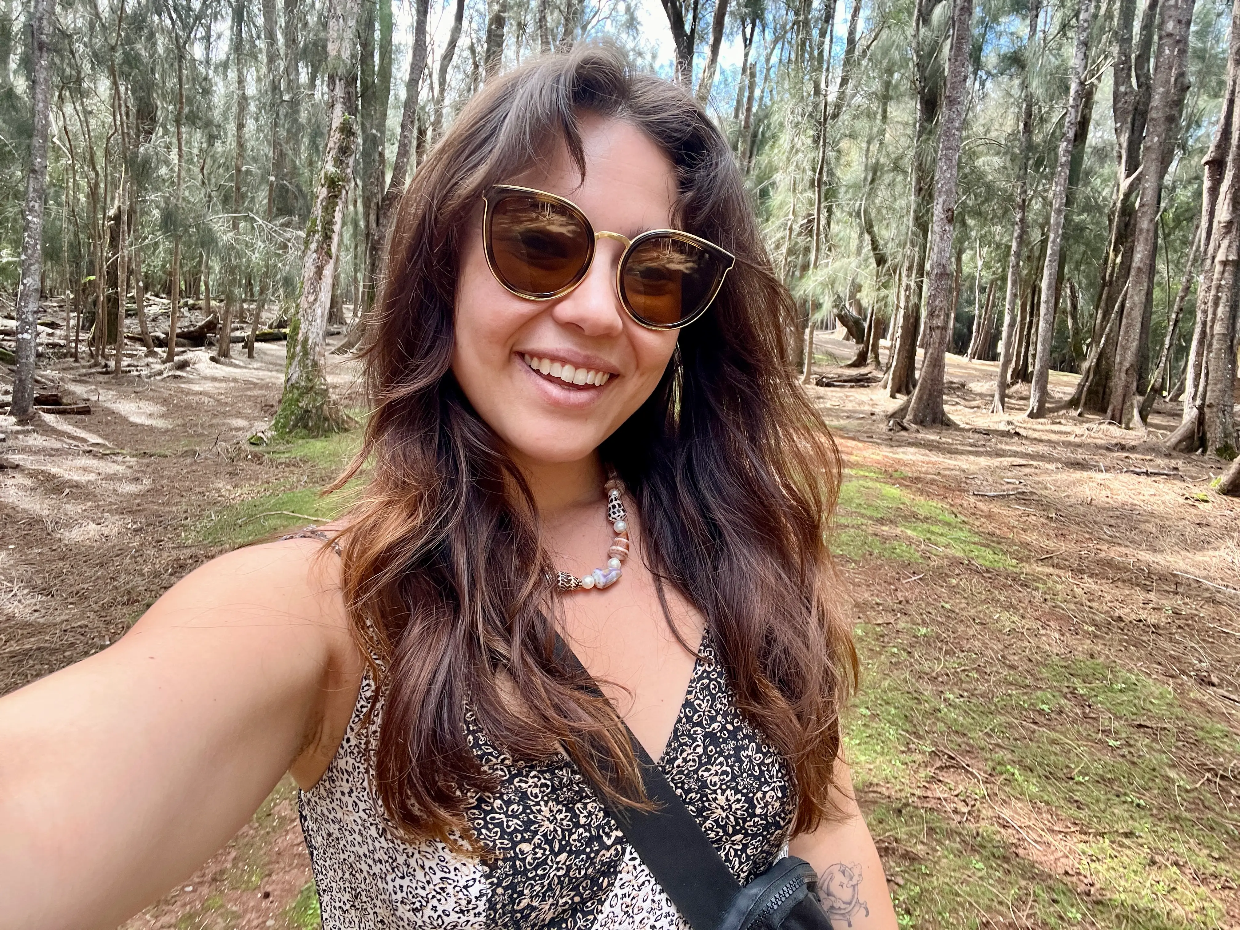 Author Ashley Probst with sunglasses on smiling