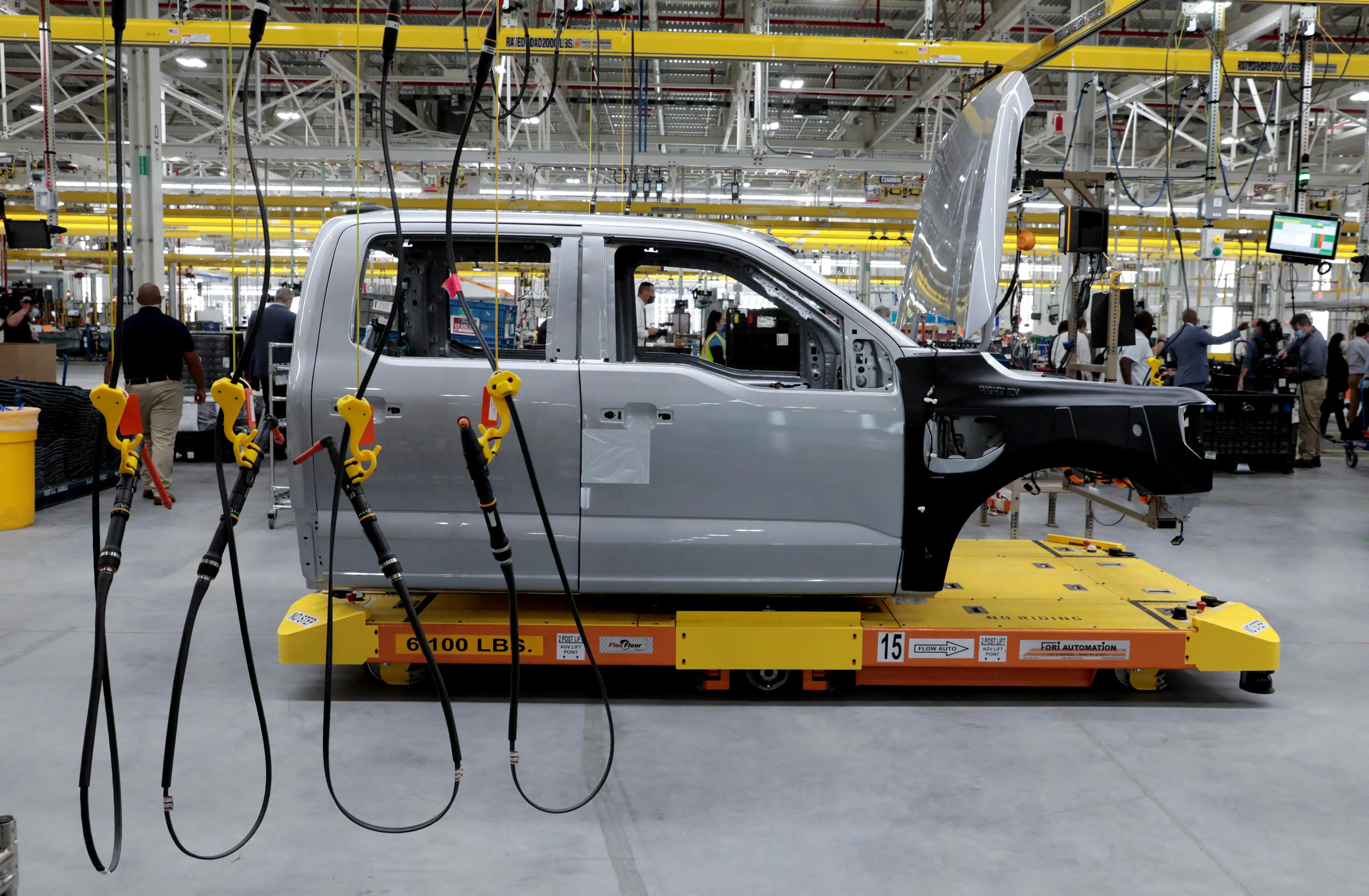 The cab to a Ford all-electric F-150 Lightning truck prototype is seen on an automated guided vehicle (AGV) at the Rouge Electric Vehicle Center in Dearborn, Michigan September 16, 2021.