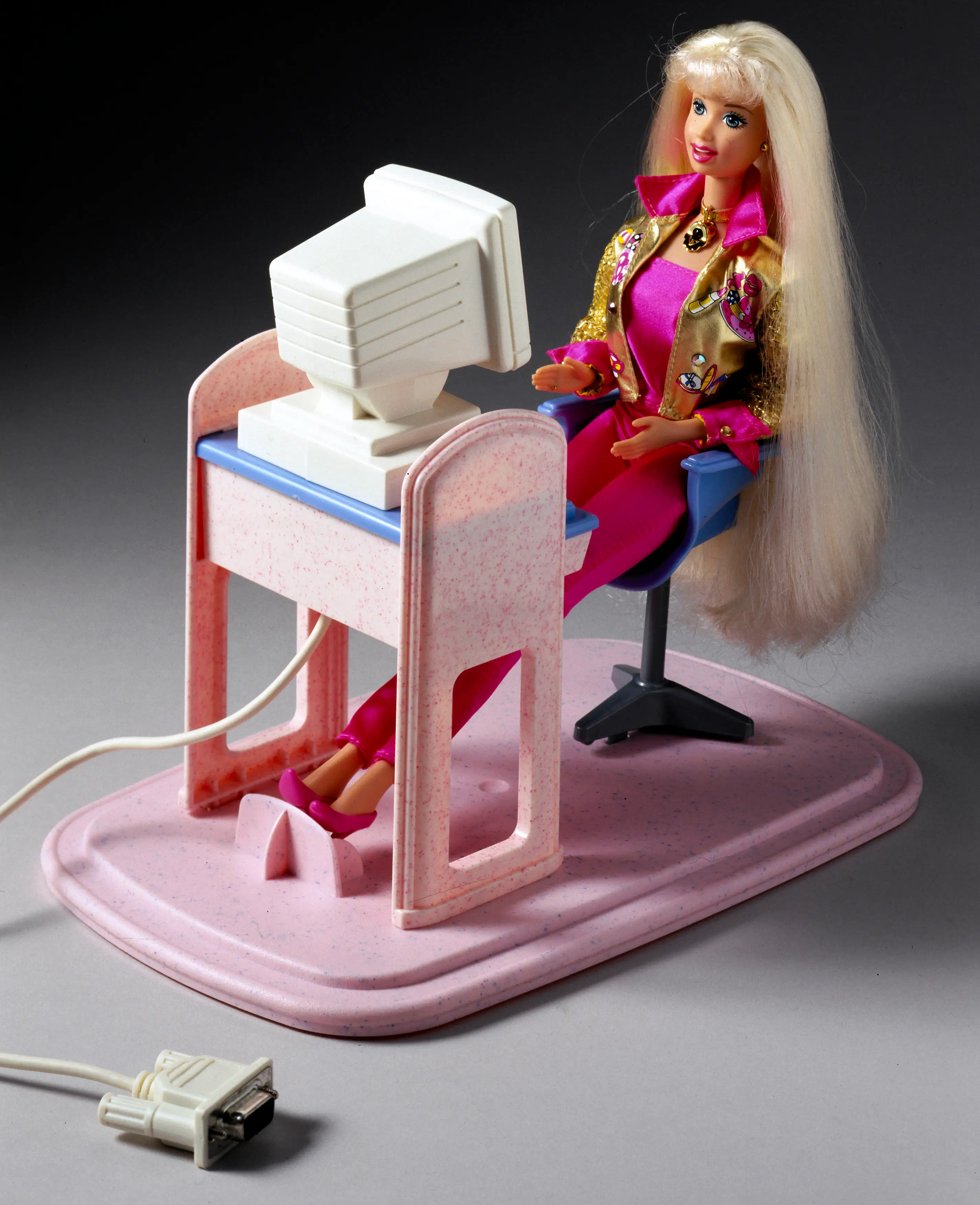 Barbie at a computer in 1997.
