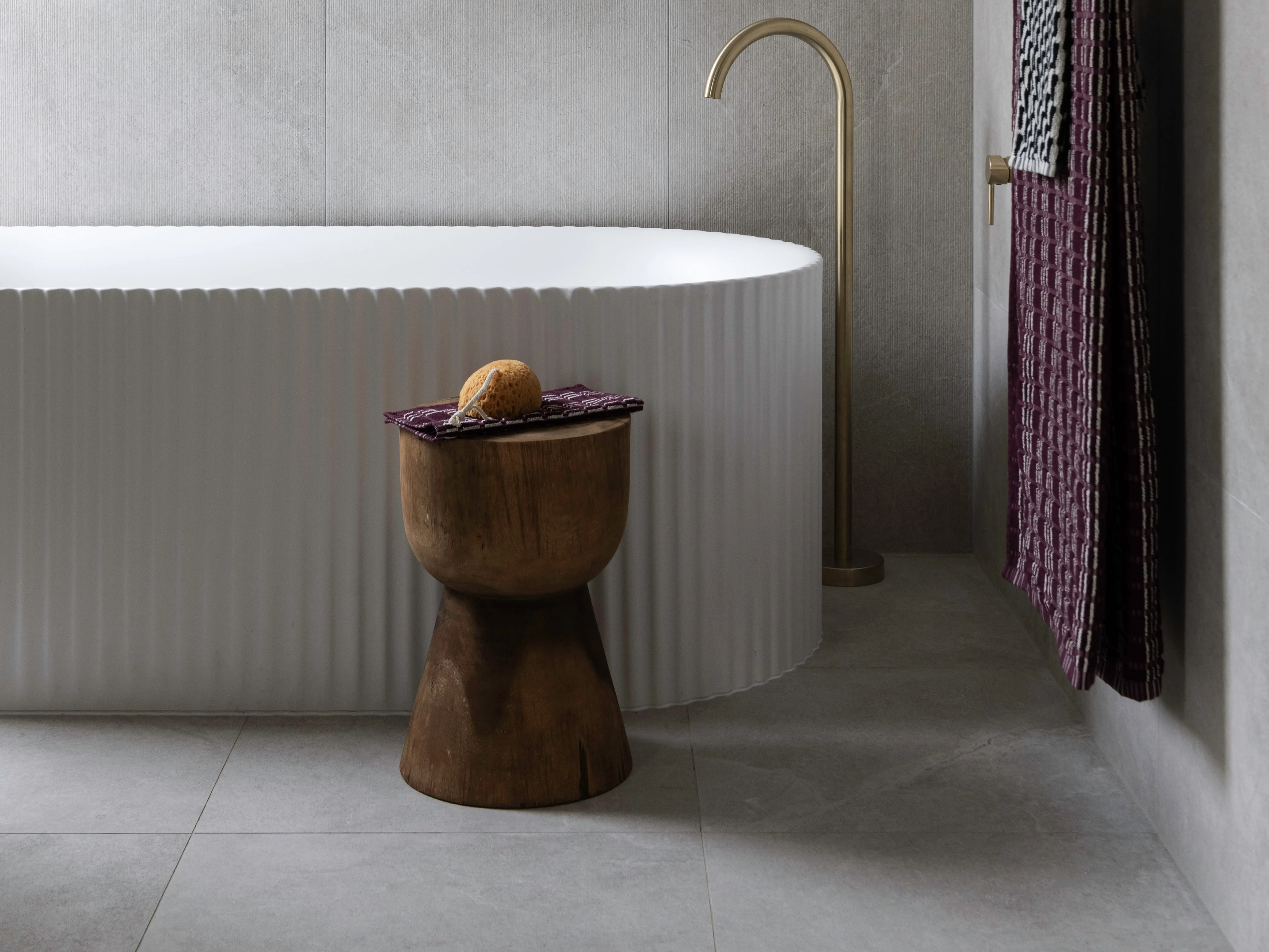 Stone floors in a bathroom.