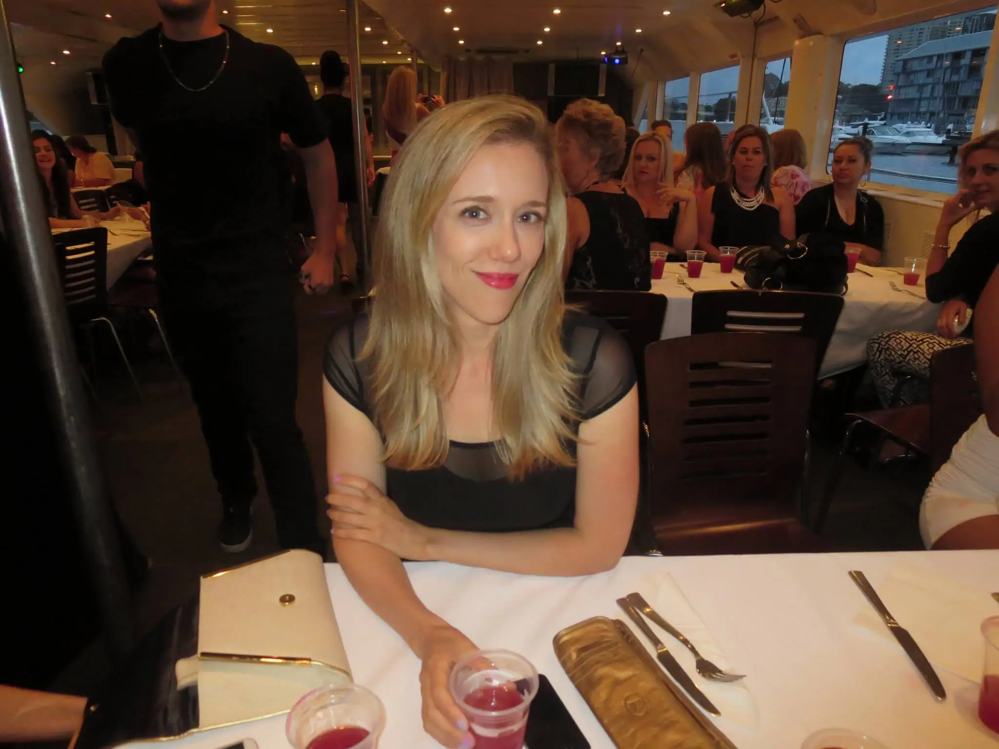 Woman in restaurant posing for photo