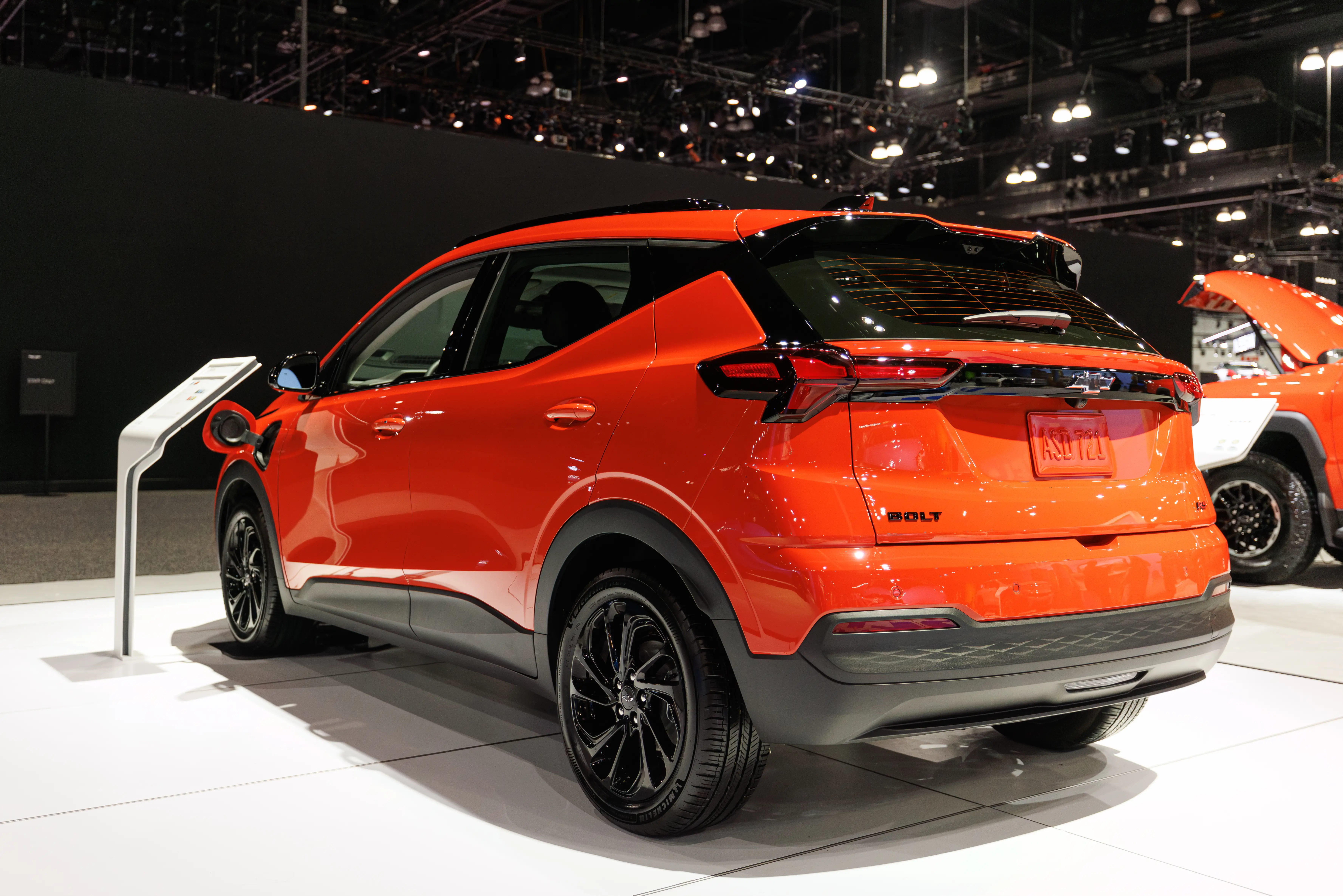 A red orange Chevy Bolt at the LA Auto Show.