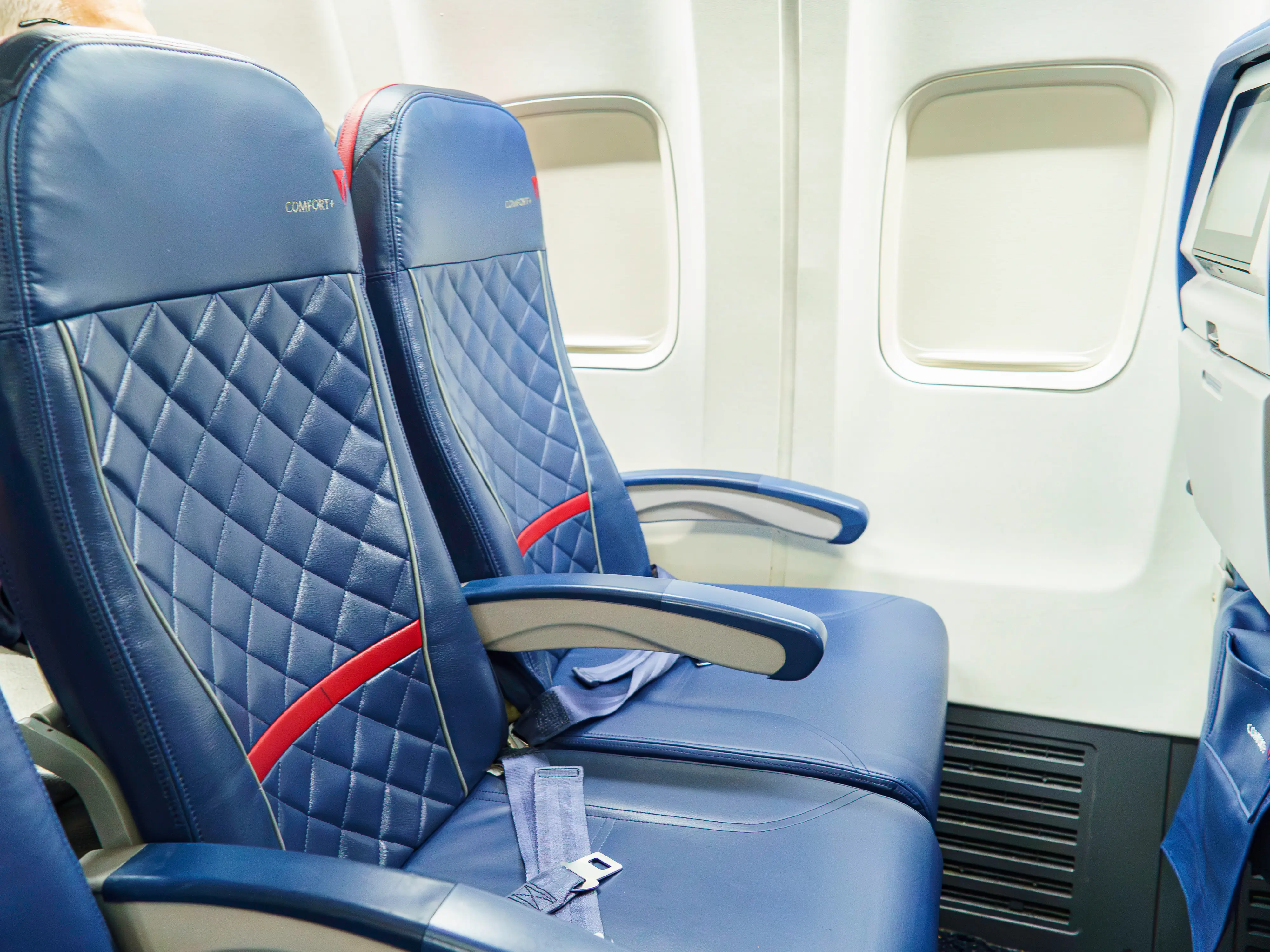 A set of Delta Comfort seats by a window