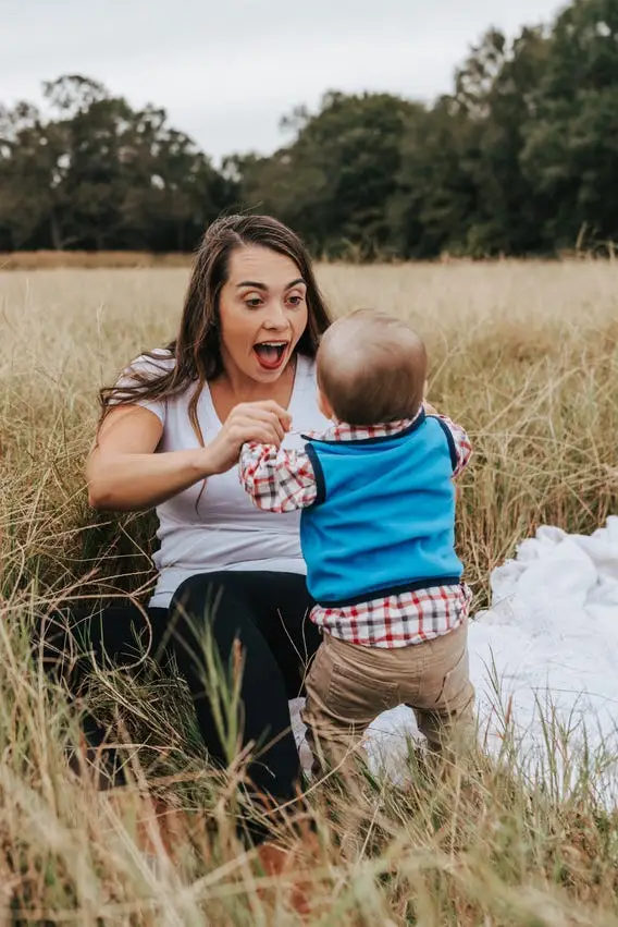 Woman playing with a toddler