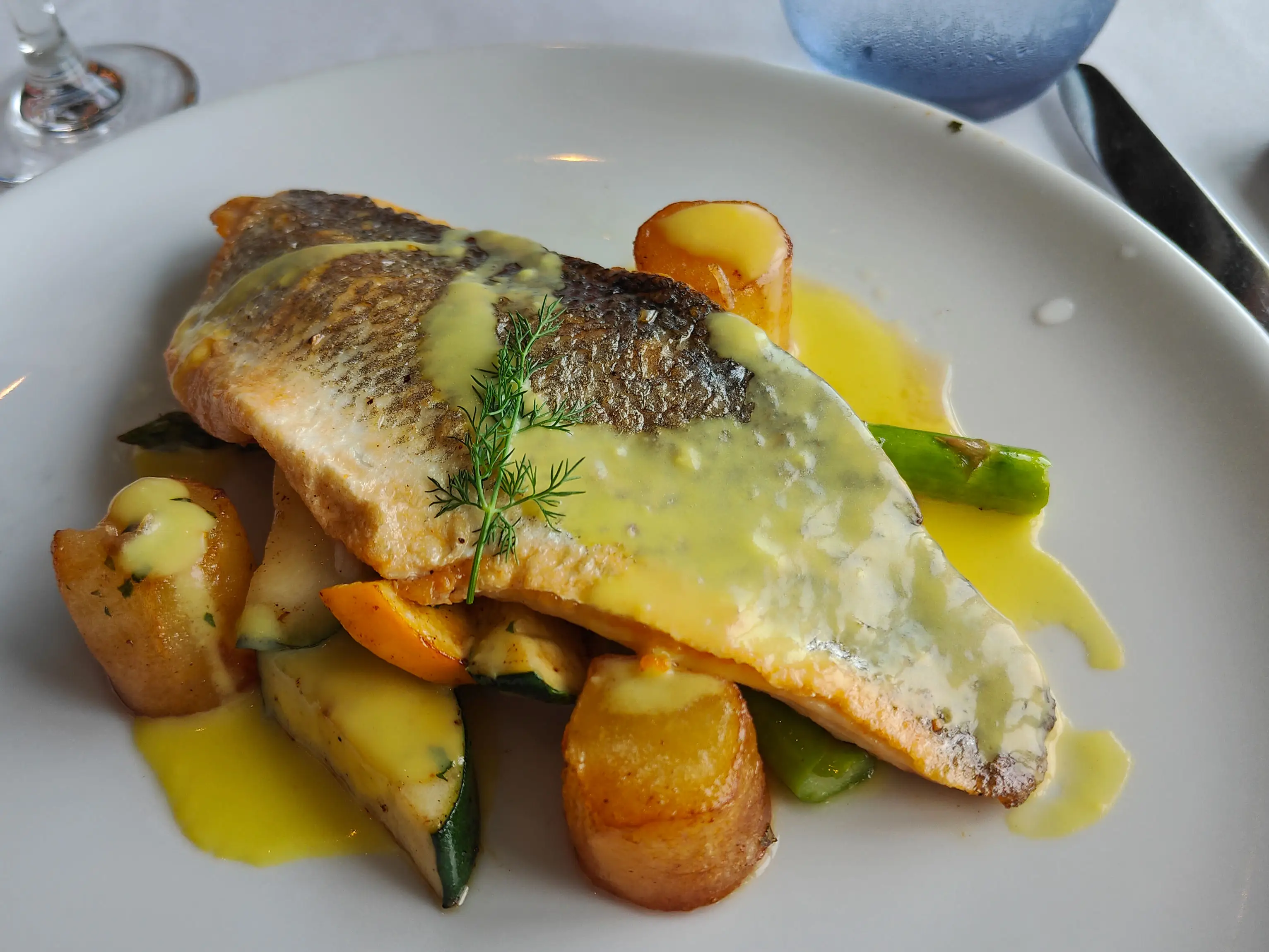 A beautifully plated cruise ship meal.
