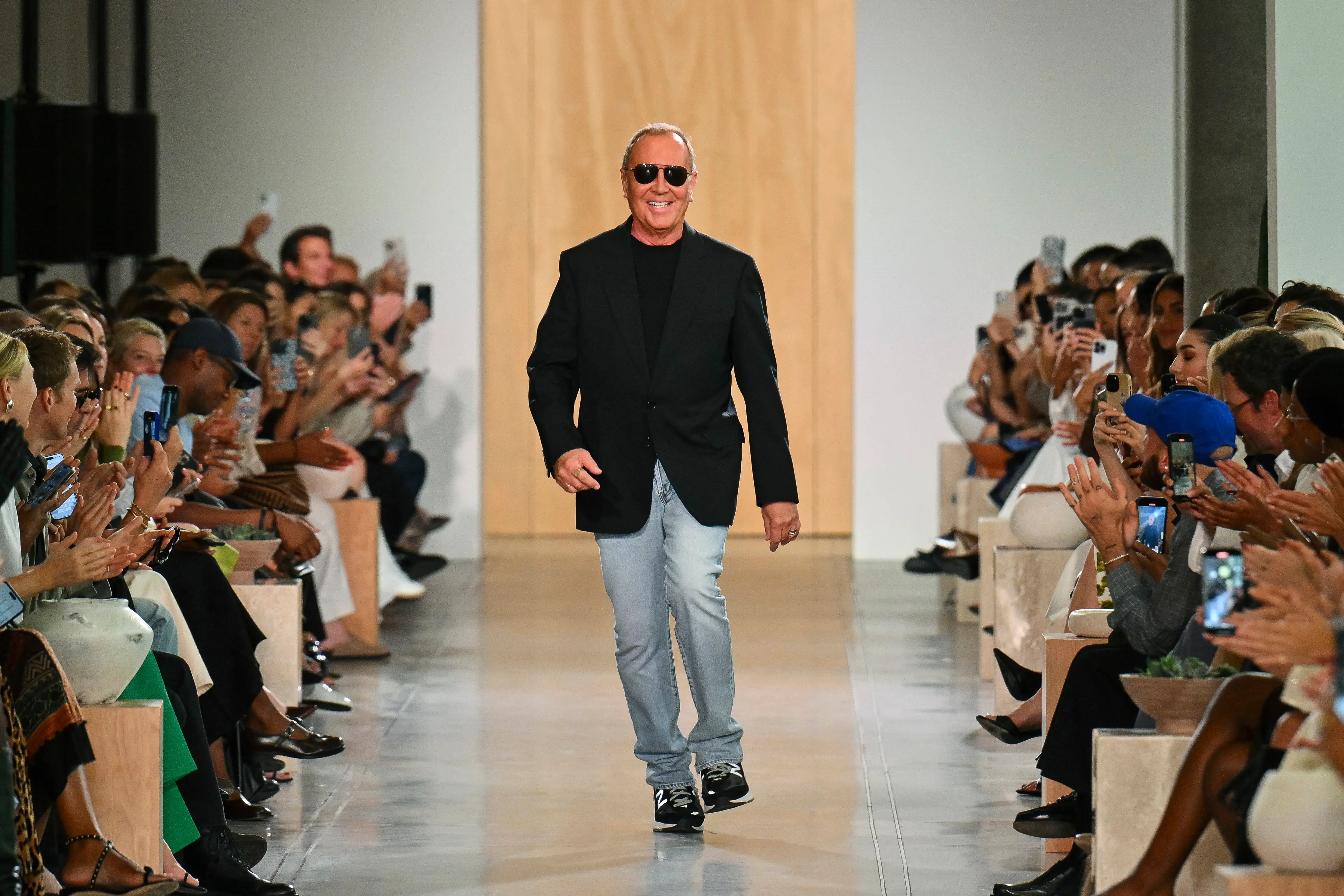 Designer Michael Kors on the runway during the Michael Kors Spring/Summer 2026 collection show.