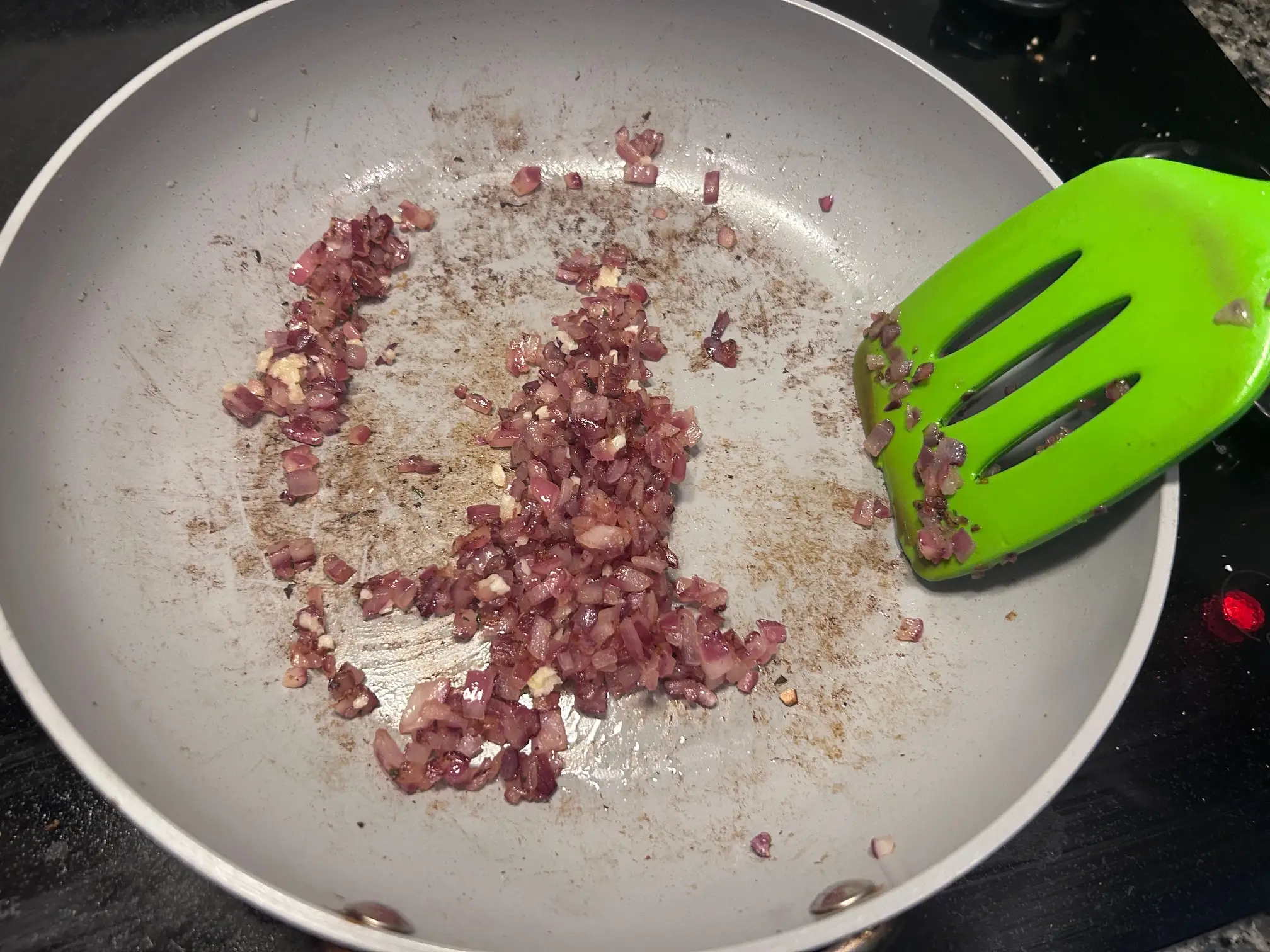 Sauteeing the onion for Gordon Ramsay's Bloody Mary Linguine