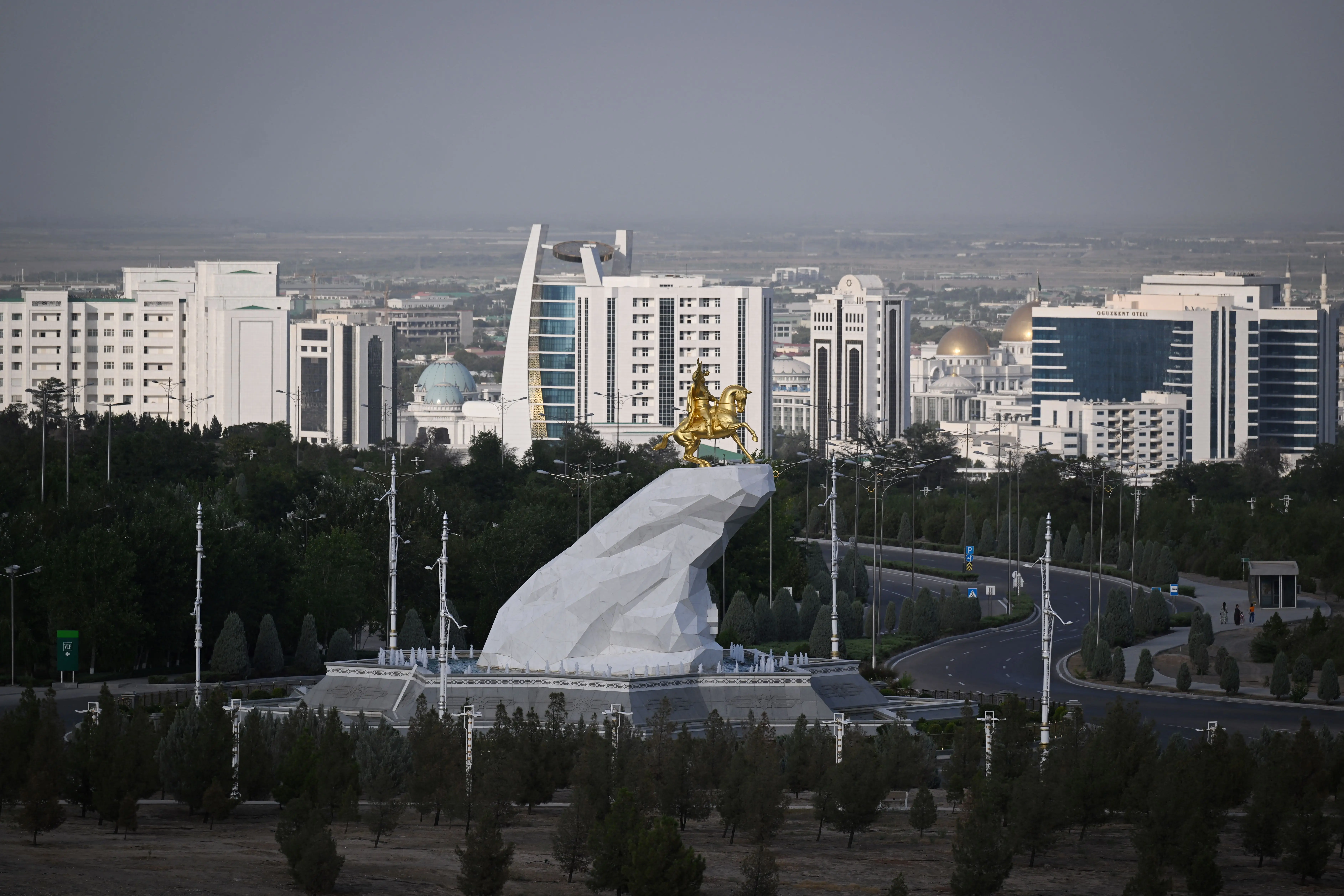 A view shows the Golden Horse Monument featuring former Turkmen leader Gurbanguly Berdymukhamedov riding an Akhal-Teke, Turkmenistan's national horse, in Turkmenistan's capital of Ashgabat on June 28, 2023.