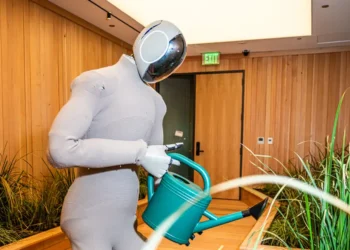 An OpenAI-backed humanoid robot startup says it’s moving away from using humans to train its Optimus rival