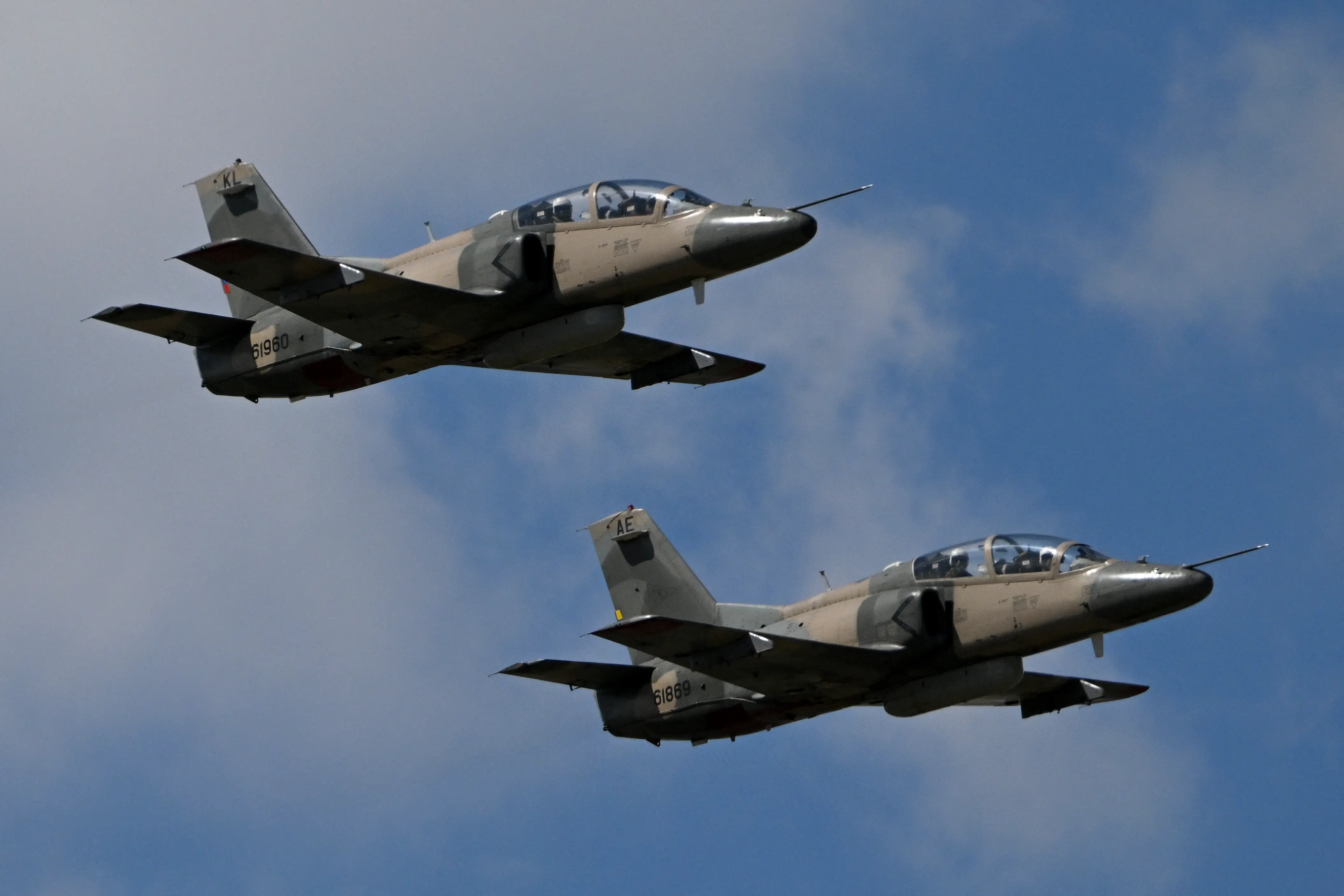 A squad of Venezuelan Air Force K8W aircraft overflies during the 2025 Venezuela industrial aviation expo at the Libertador Air Base in Maracay, Aragua State, Venezuela, on November 29, 2025.