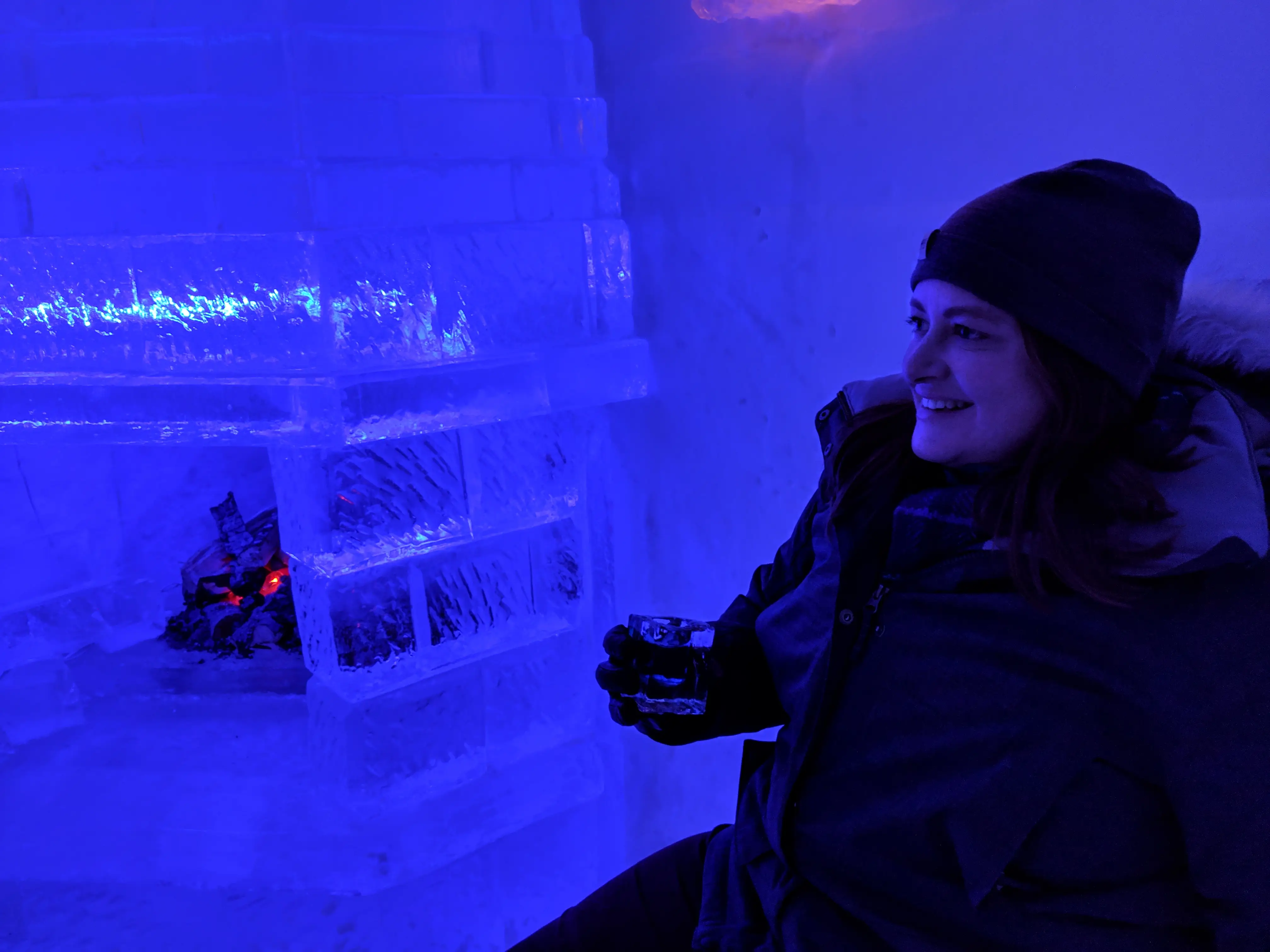 Woman smiling in ice hotel