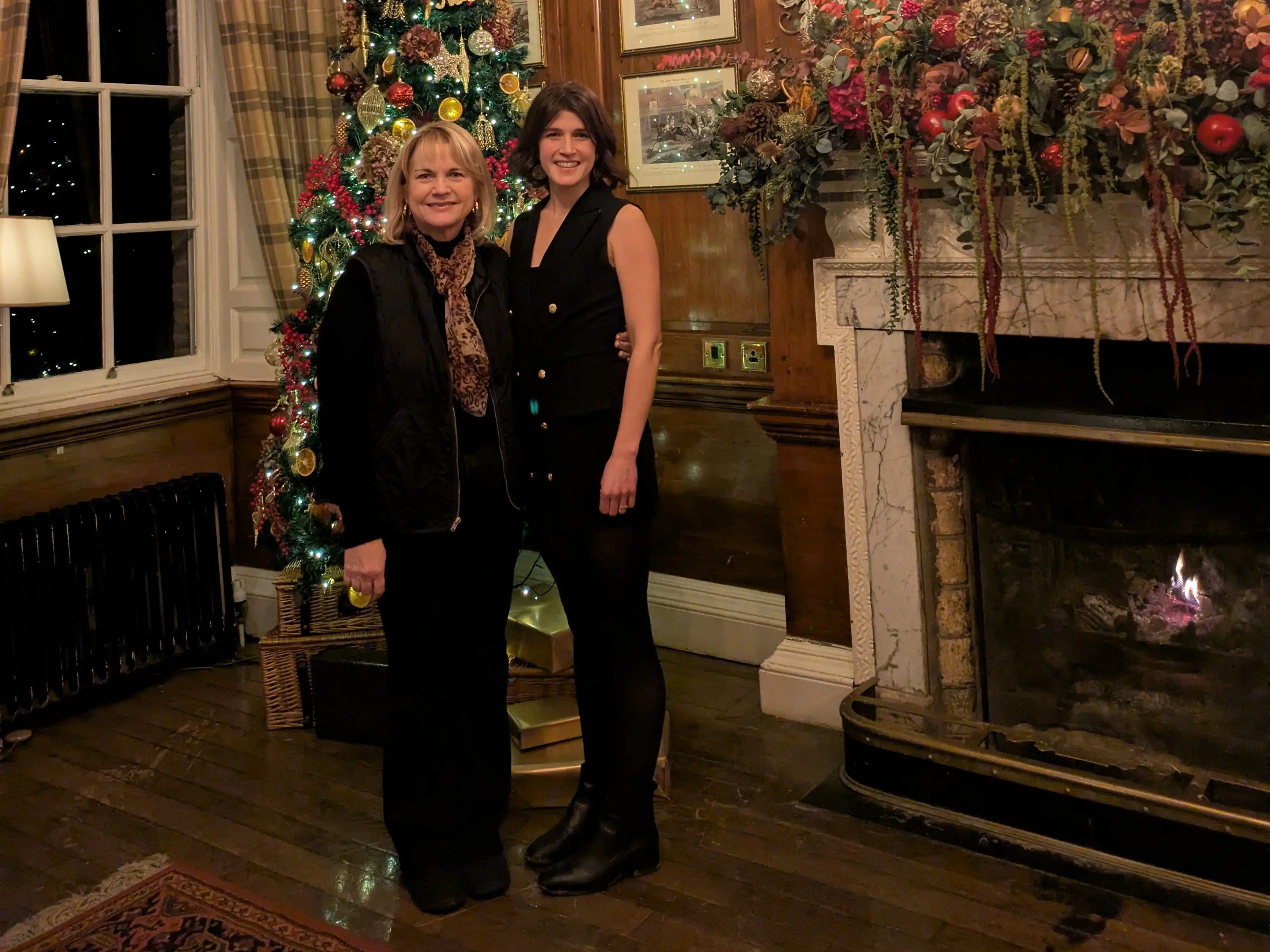 Mom and daughter posing for photo