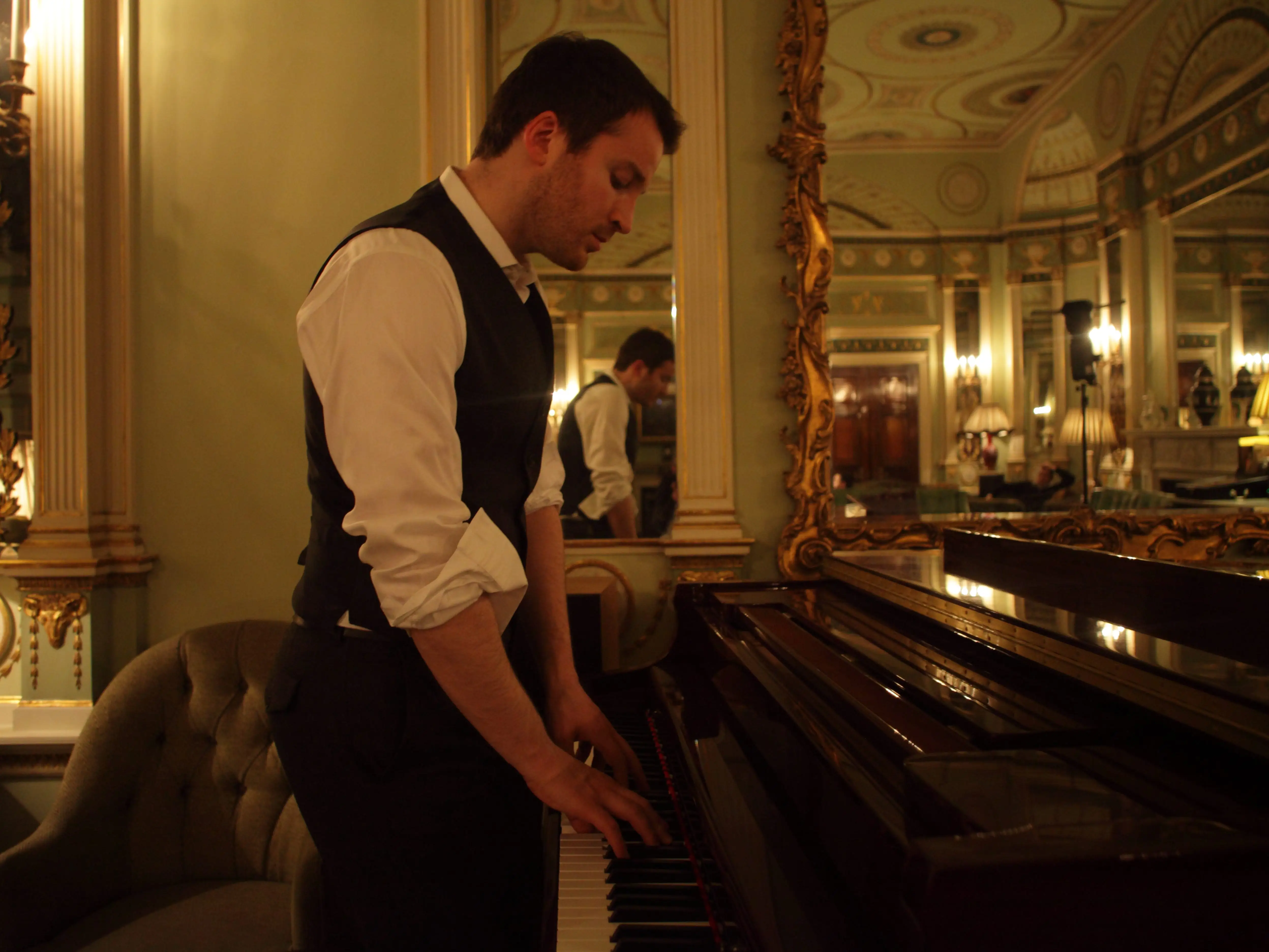 A man playing a piano