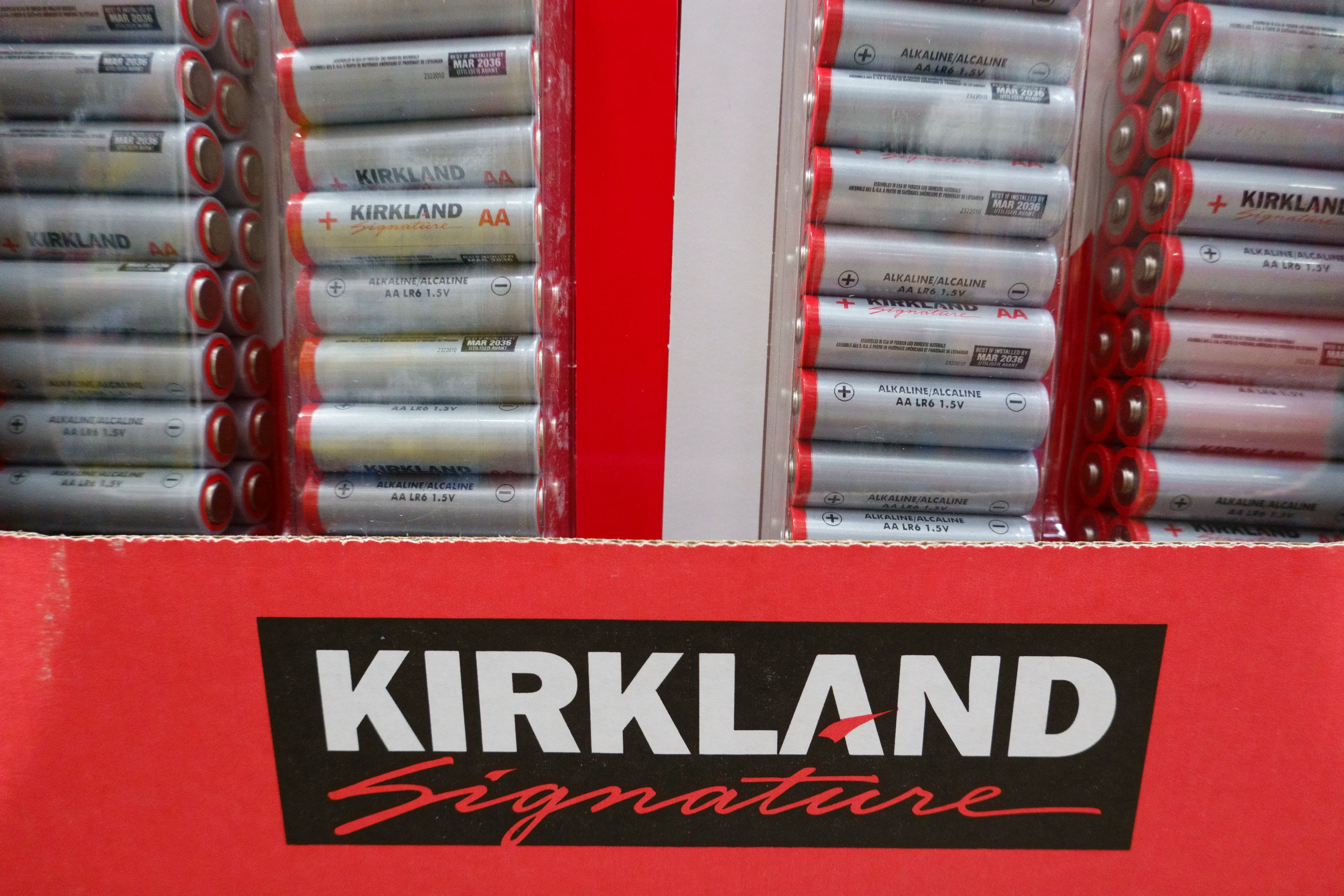 Packages of Kirkland Signature AA-size alkaline batteries are displayed at a Costco Wholesale store on July 12, 2025 in San Diego, California.