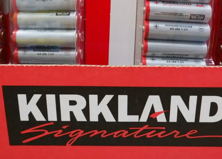 I compared Costco shopping carts of Kirkland Signature products and brand names. The price differences surprised me.