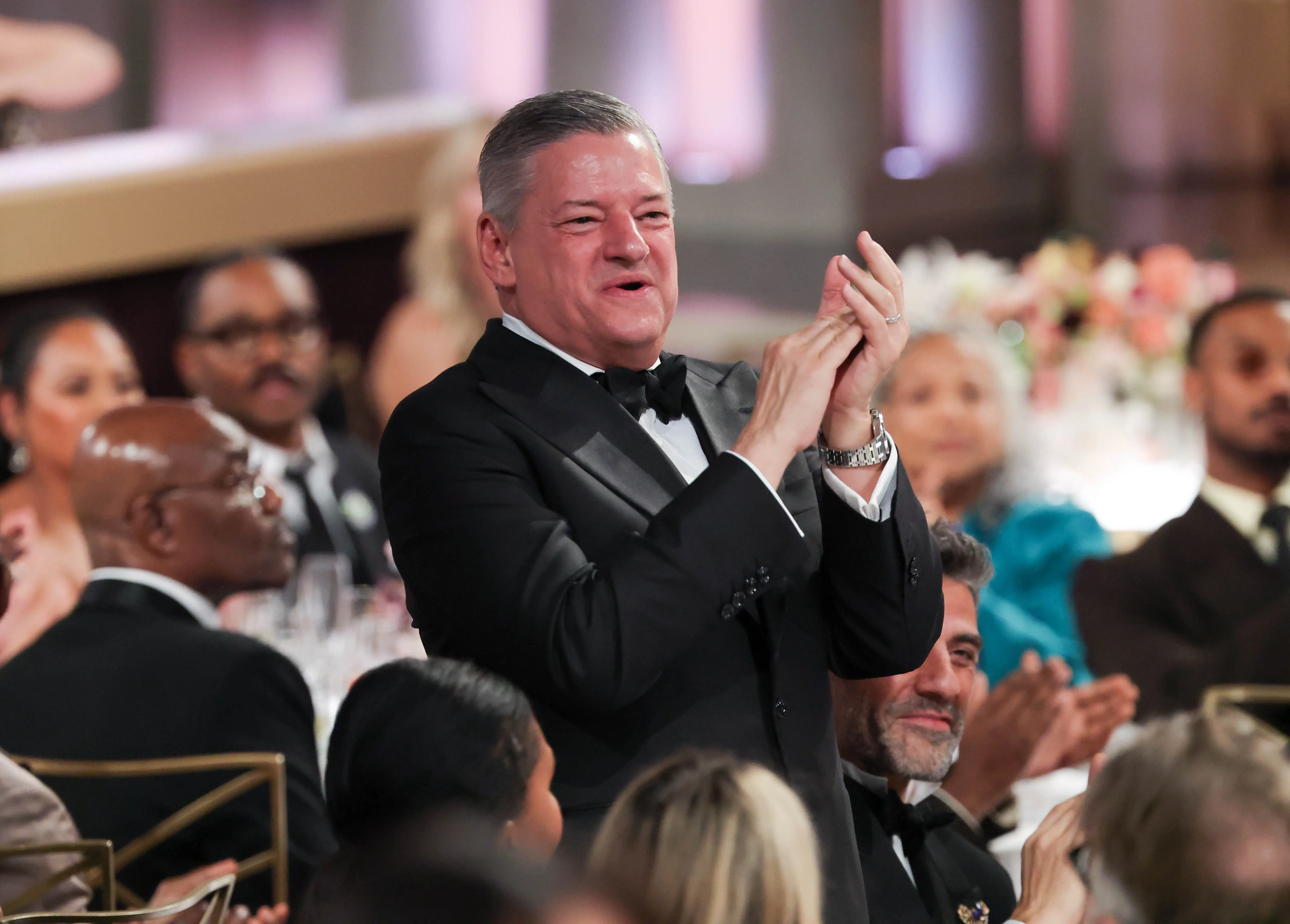 Netflix co-CEO Ted Sarandos applauds at the Golden Globe awards, January 2026