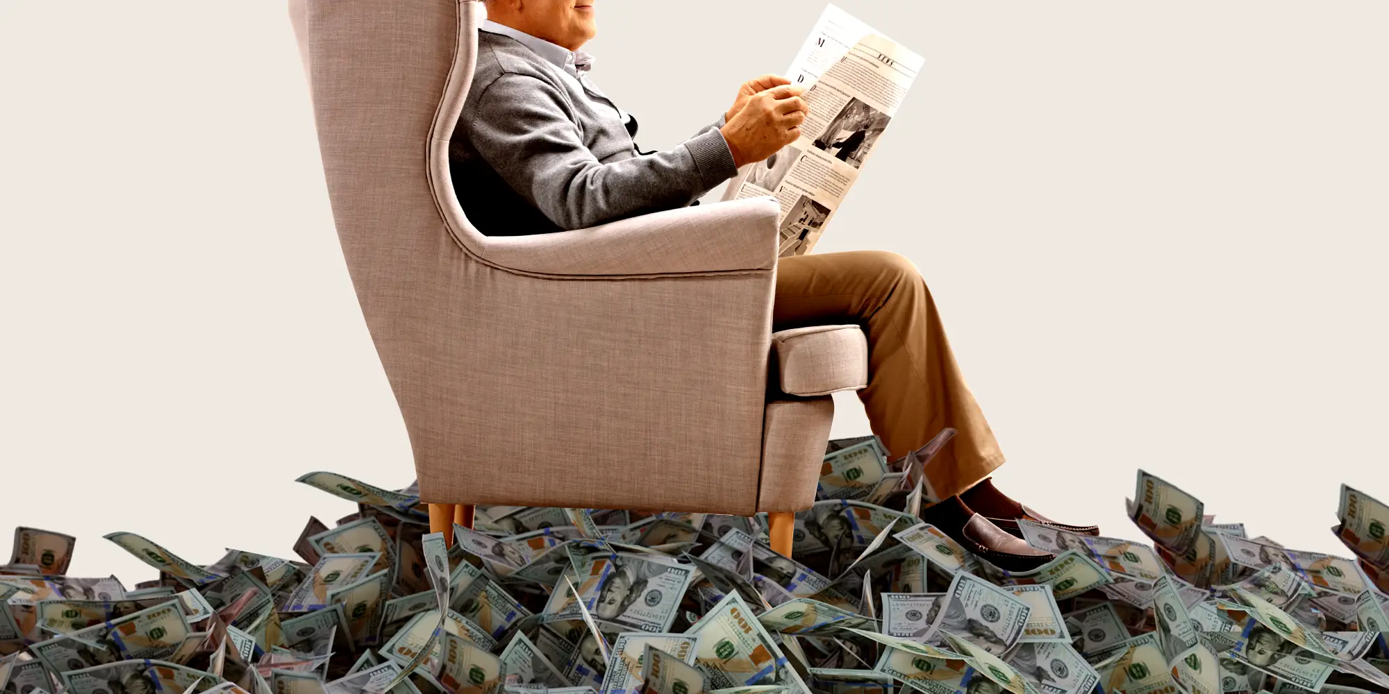 A retired man sitting in an armchair surrounded by money