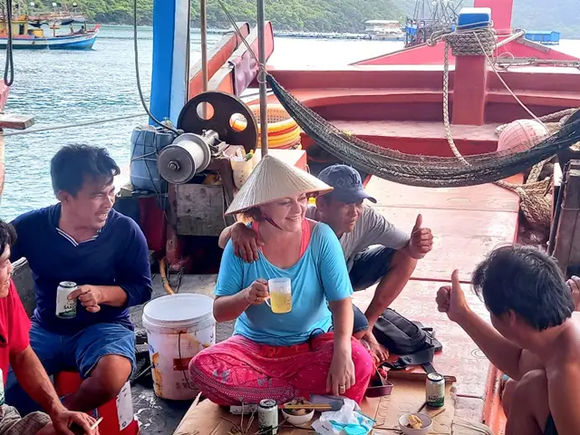 Drinking and eating with fisherman after days of storms kept them stuck in the harbour on Con Dau Island. The generosity of sharing meals is something I love about the Vietnamese.