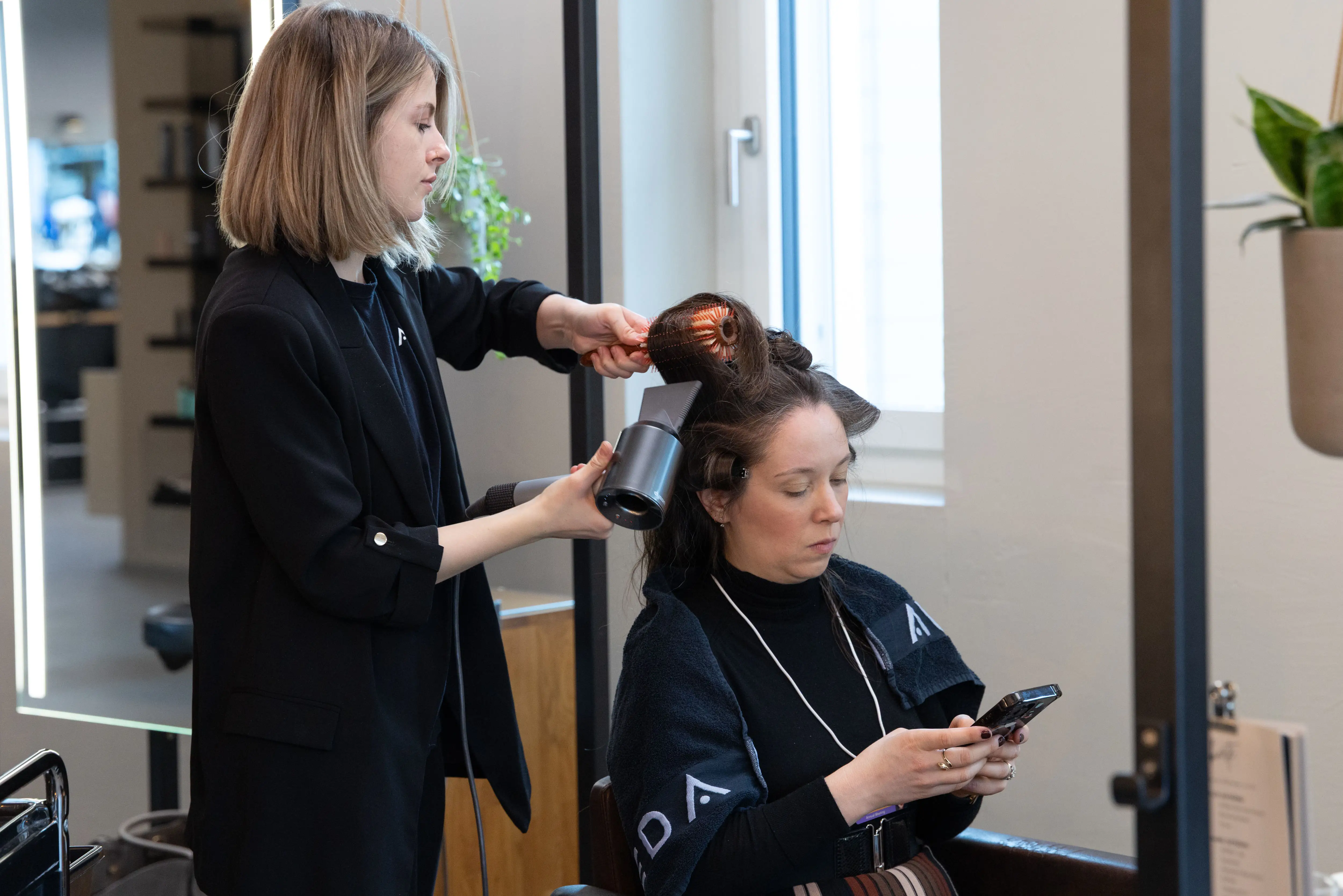 Kim Last at the Kopps Coiffure salon in Davos, Switzerland.