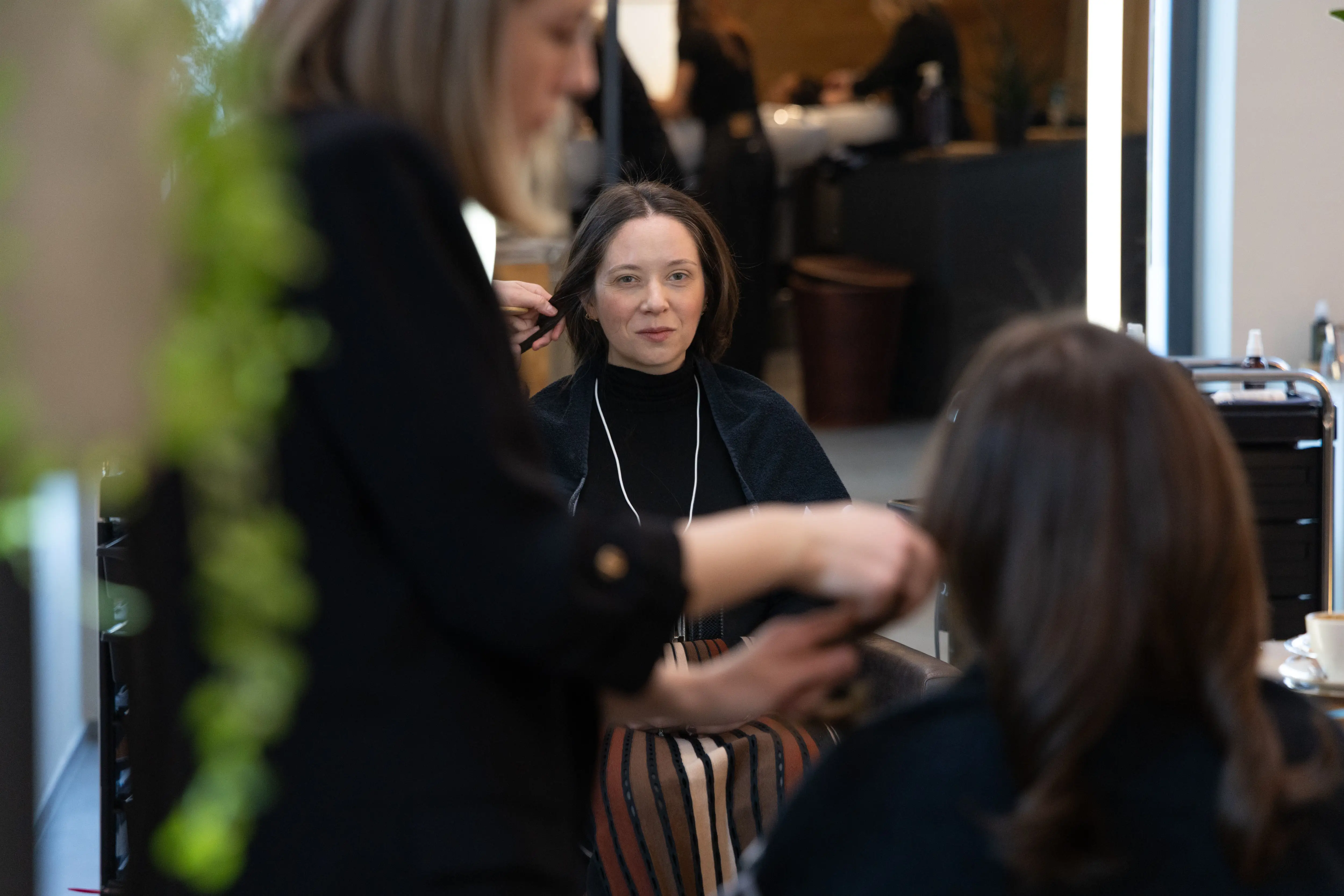 Kim Last at the Kopps Coiffure salon in Davos, Switzerland.