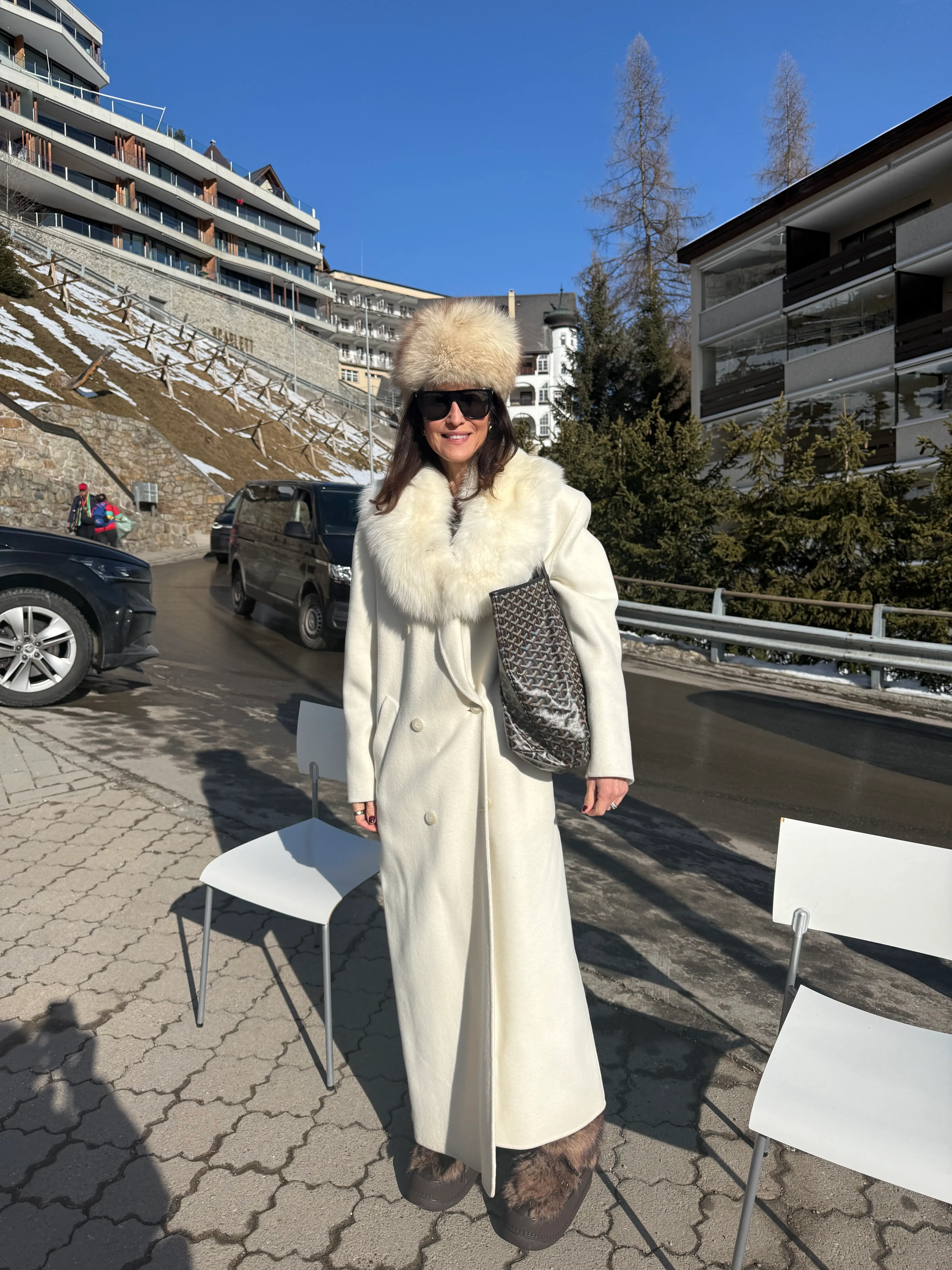 Sarah Backhouse of the World Fifty Group sports a Frankie Shop coat and Saint Laurent sunglasses.