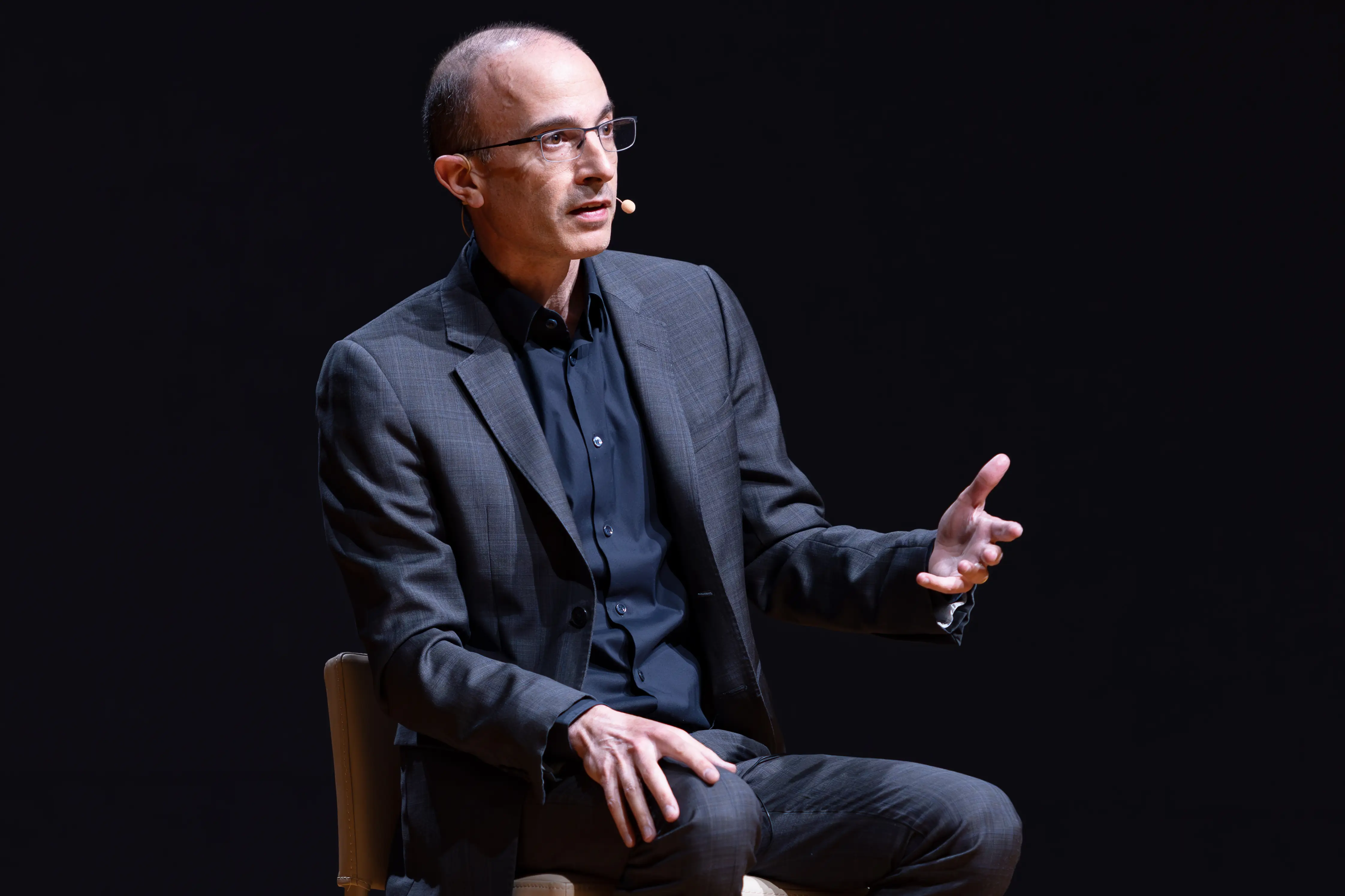Yuval Noah Harari in a black suit