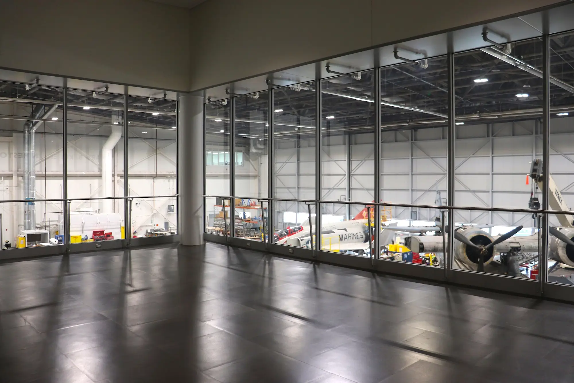 Observation windows overlook the Mary Baker Engen Restoration Hangar at the National Air and Space Museum.