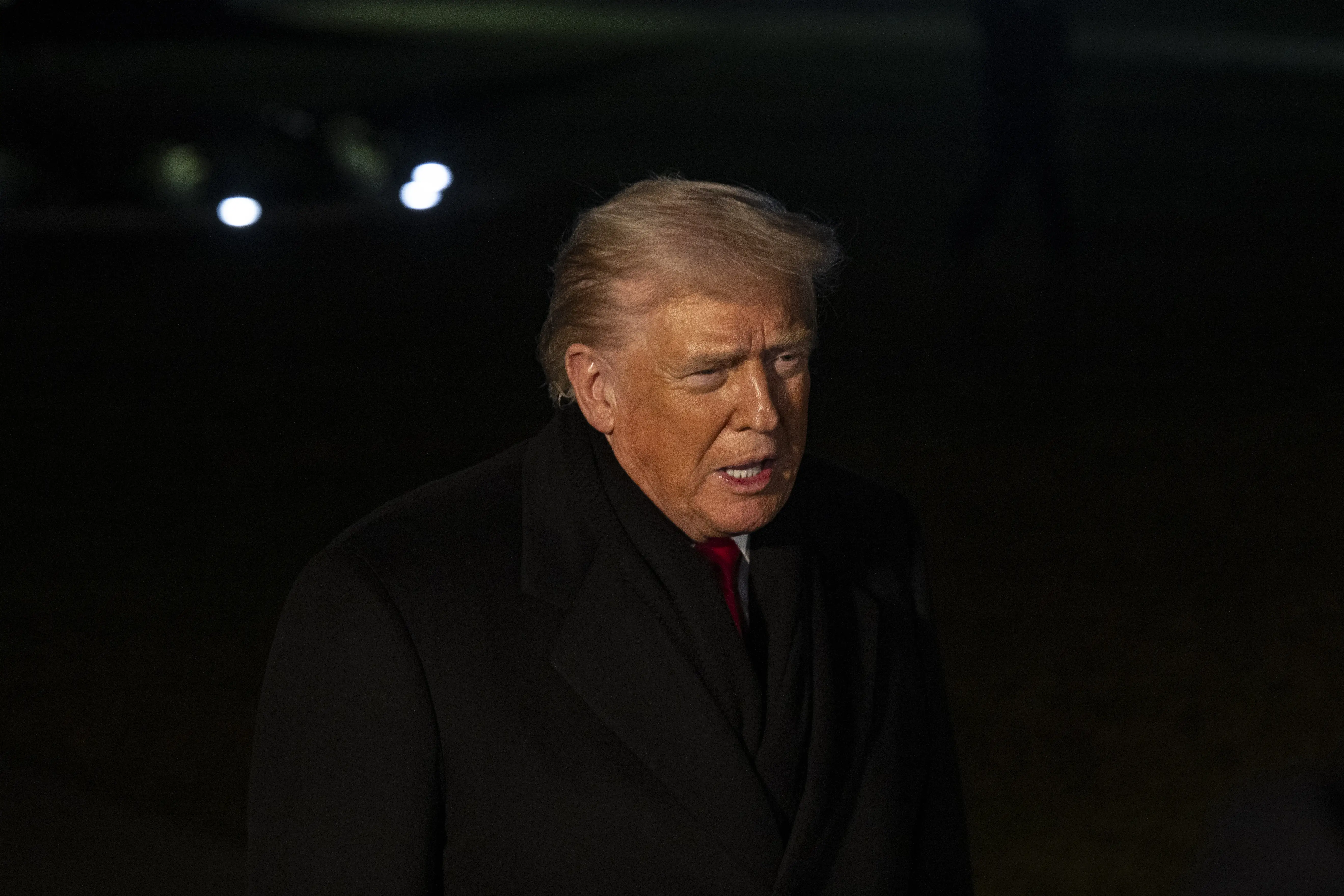 United States President Donald Trump speaks to the press before he departs the White House en route to Davos, Switzerland, to attend the World Economic Forum (WEF),