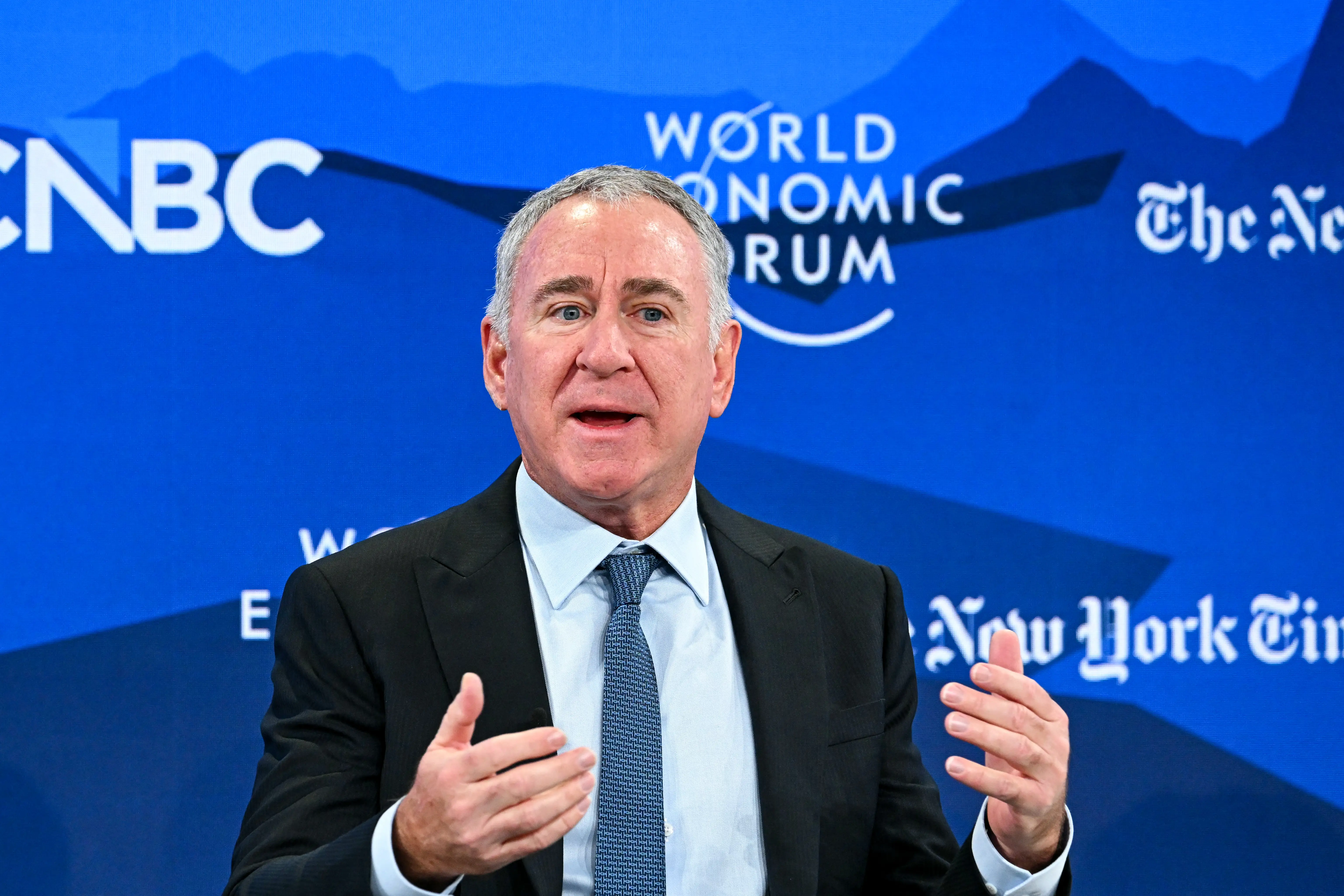 Founder and CEO of Citadel Ken Griffin gestures as he speaks in an interview during the World Economic Forum annual meeting in Davos.