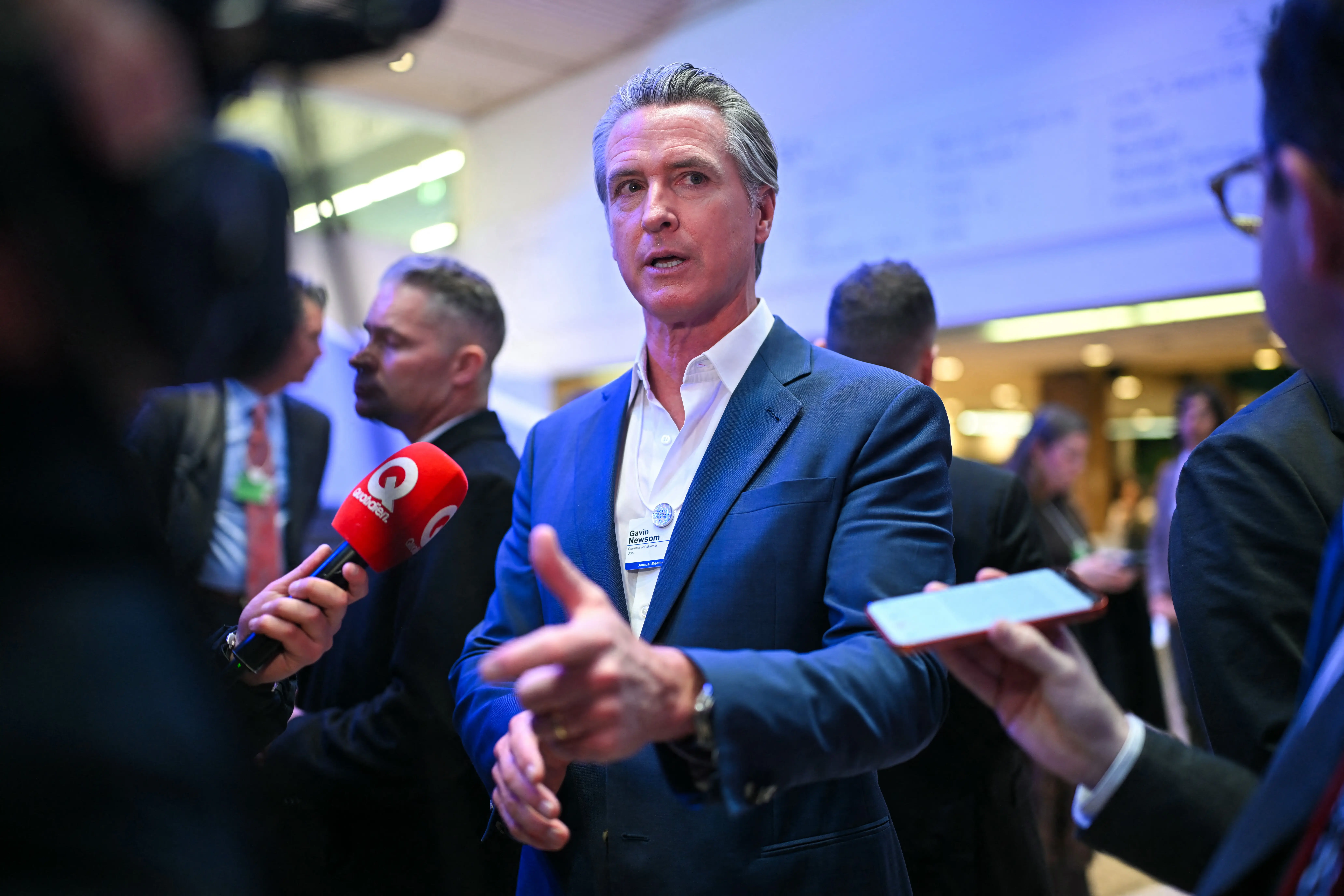 US Governor of California Gavin Newsom speaks to the press on the sidelines of the World Economic Forum annual meeting in Davos