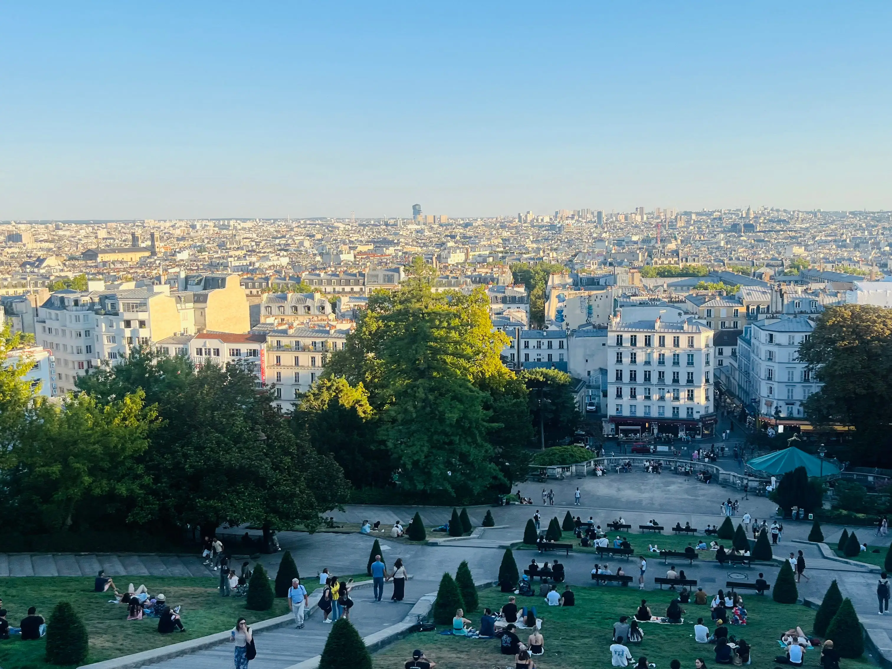 A wide shot of the view of Paris from Sacré-Cœur Basilica.