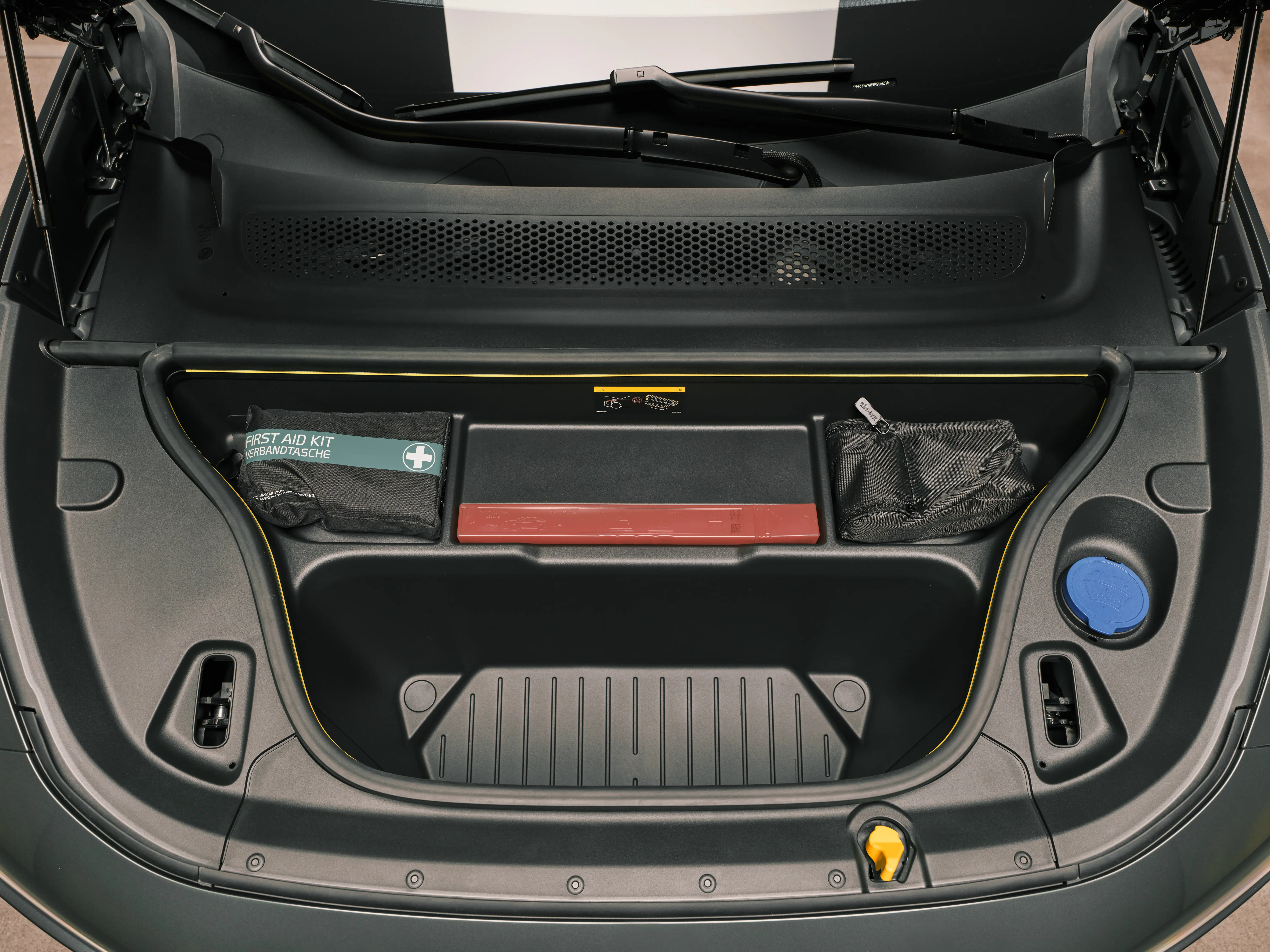 The hood is opened on the EX60, revealing an additional storage space, known as a front-trunk or frunk.