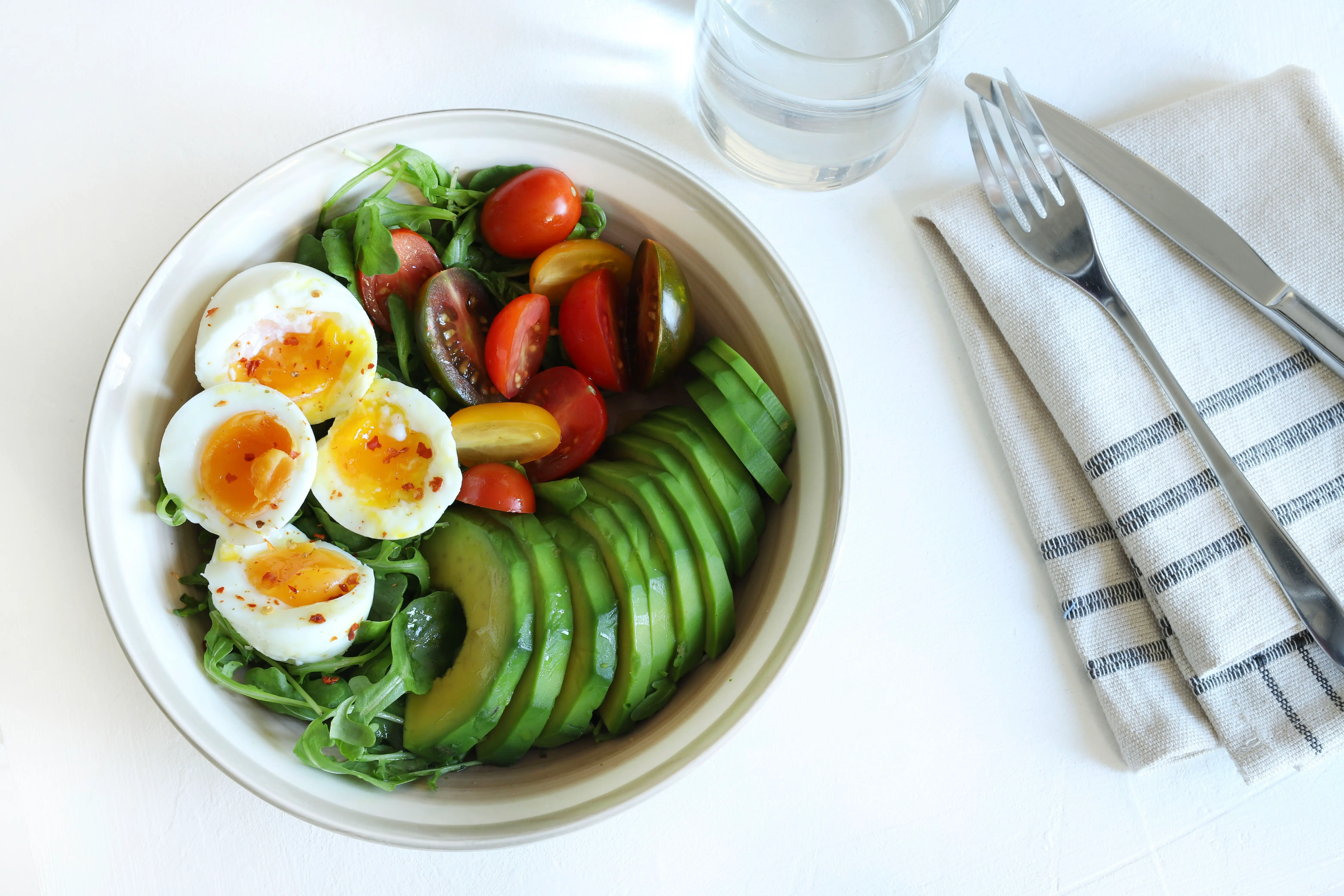salad with egg avocado and tomatoes