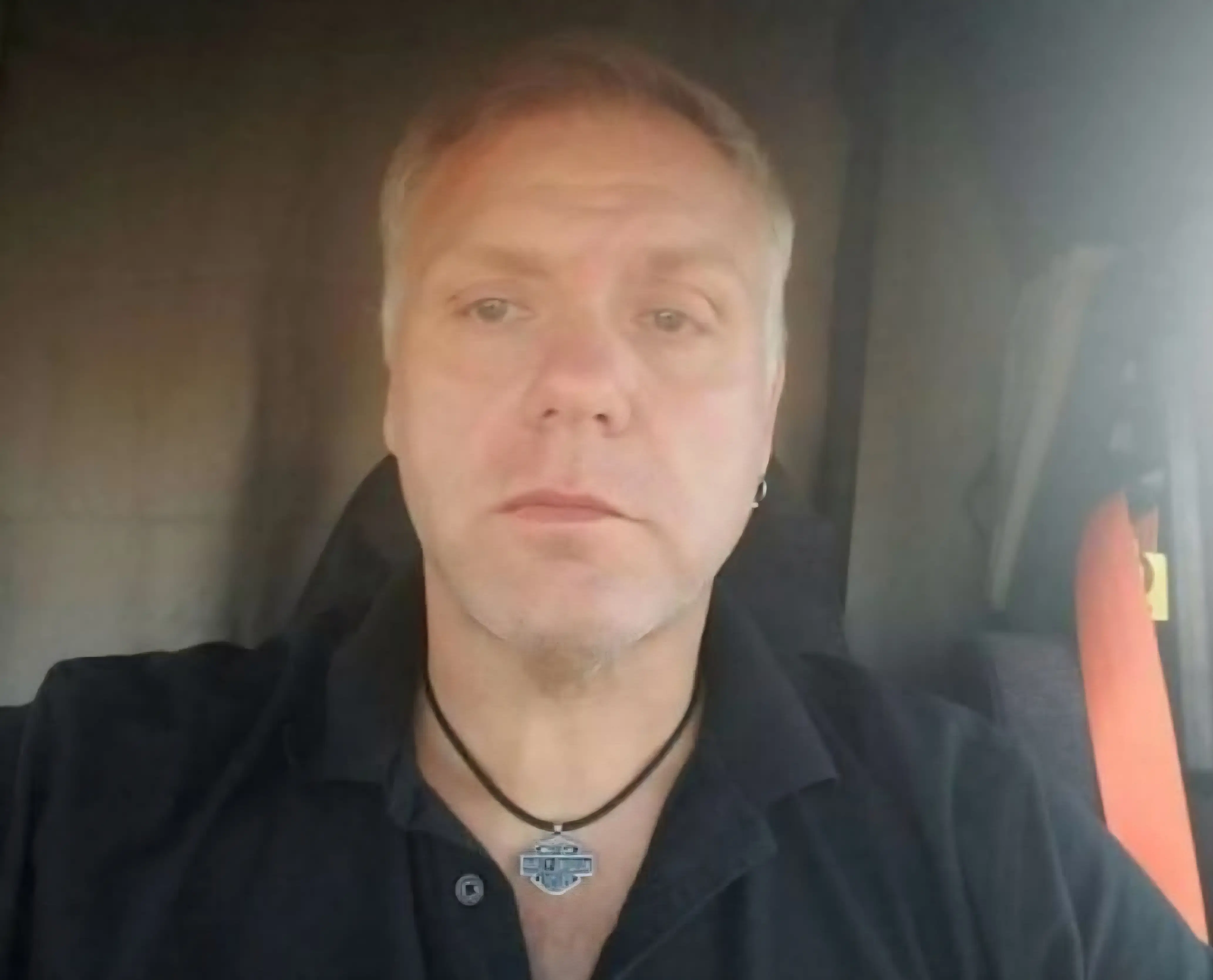 jerry in his truck, face visibly skinnier