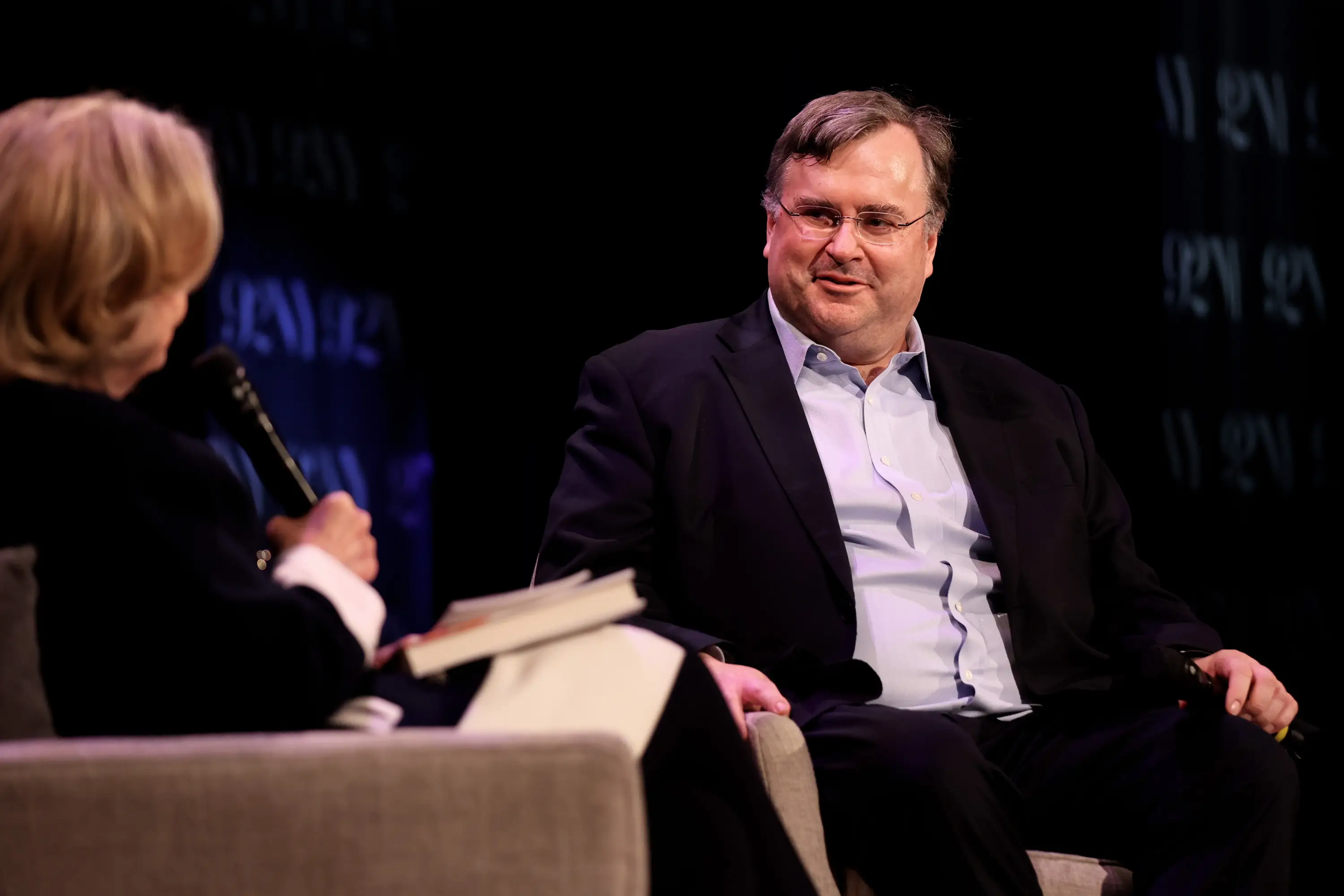 LinkedIn cofounder Reid Hoffman is being interviewed on stage.