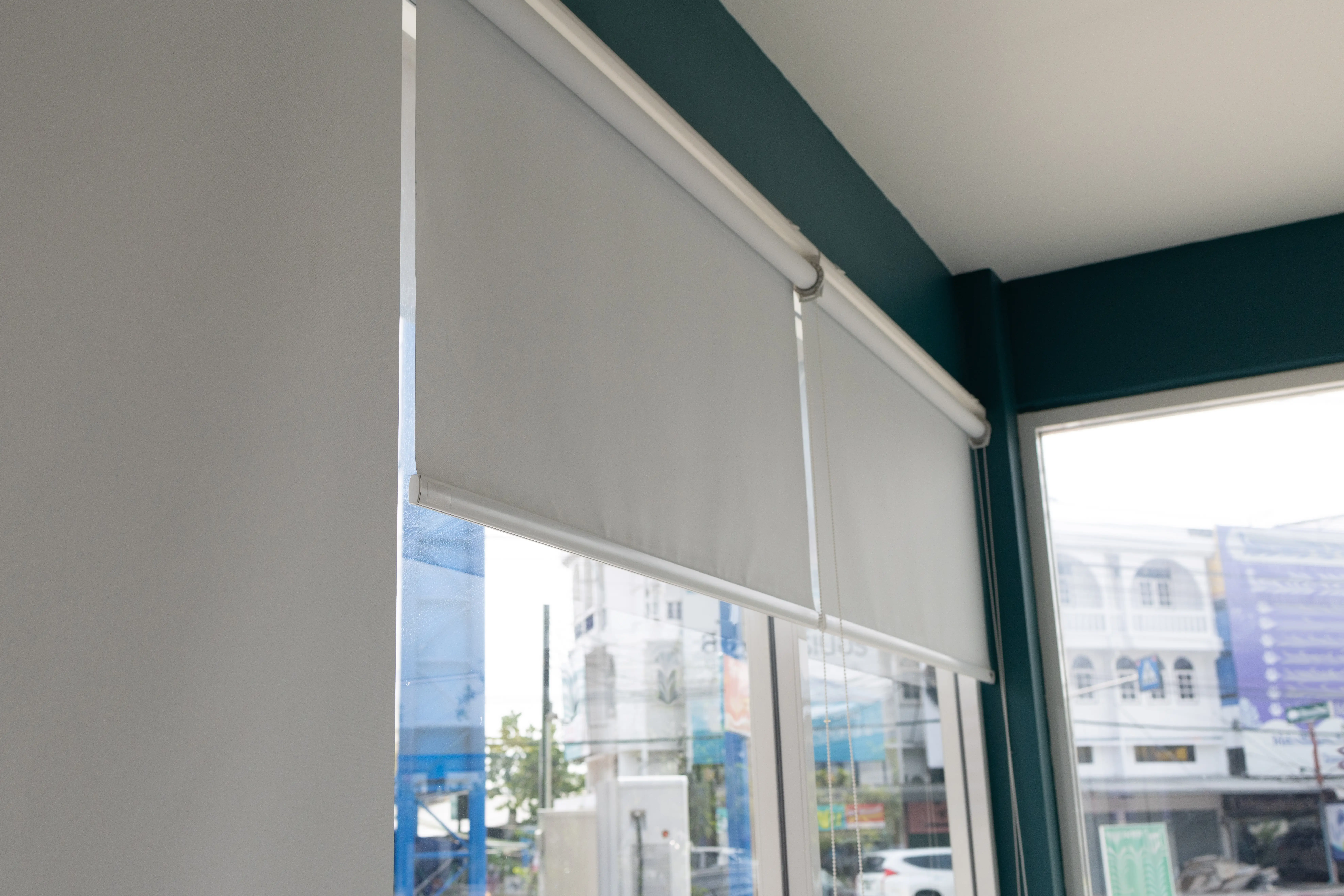 Window with roller shades