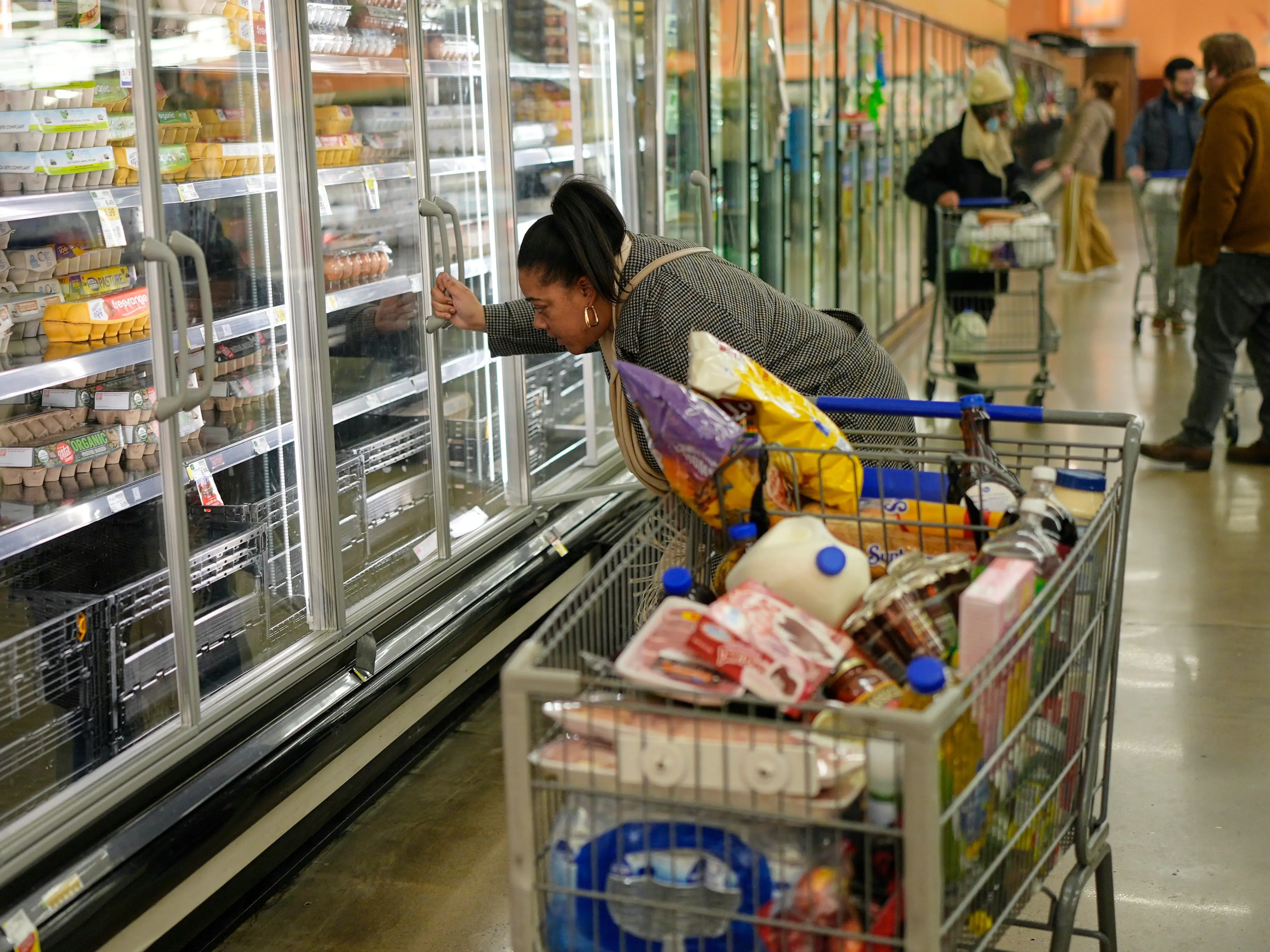 Luz Lopez shops for groceries Wednesday, Jan. 21, 2026, in Nashville, Tenn., ahead of a winter storm expected to hit the state over the weekend.