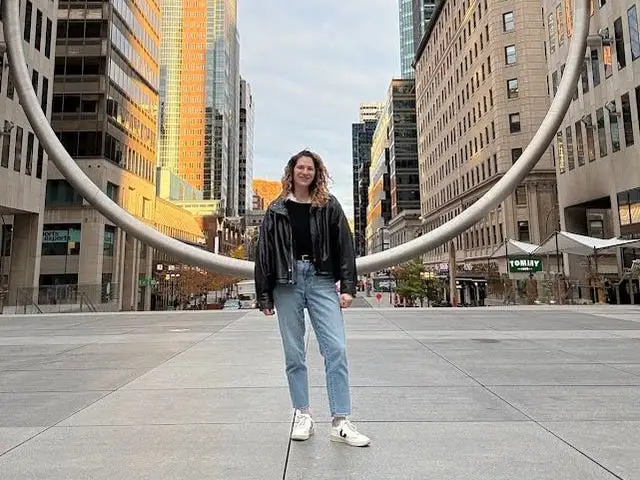 The writer posing on a street in Montreal.