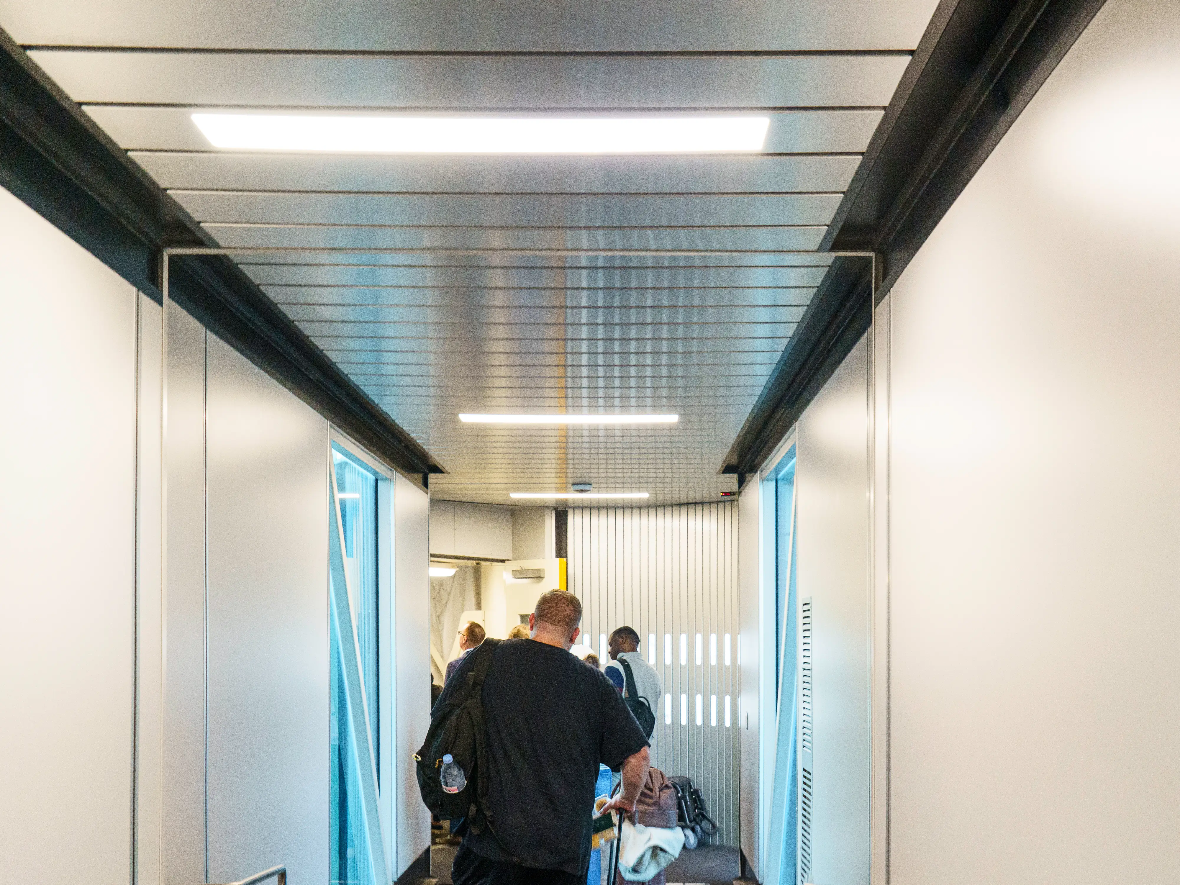 Passengers board a Delta plane