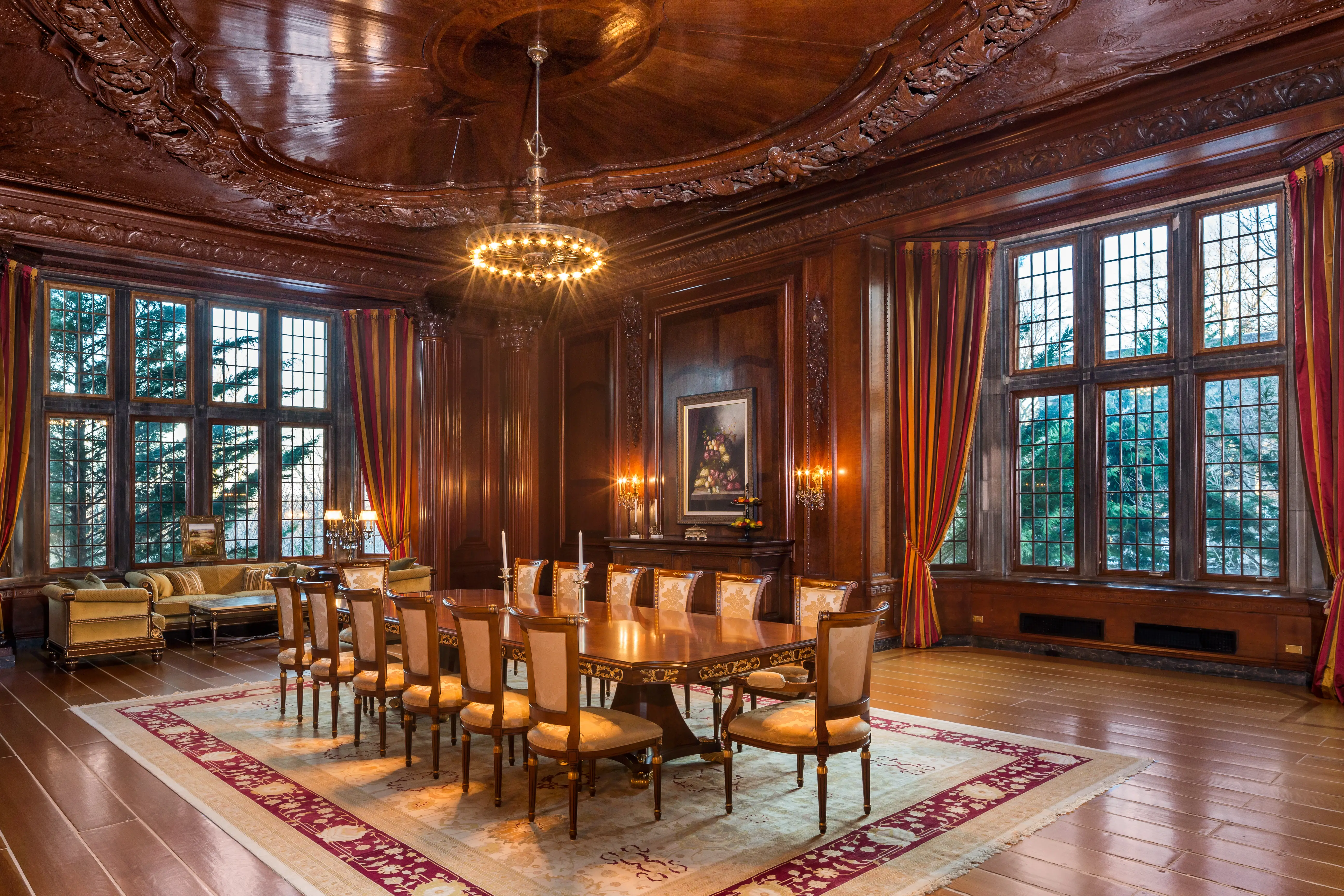 The bright and spacious dining room of the Crocker-McMillin mansion has floor-to-ceiling windows.