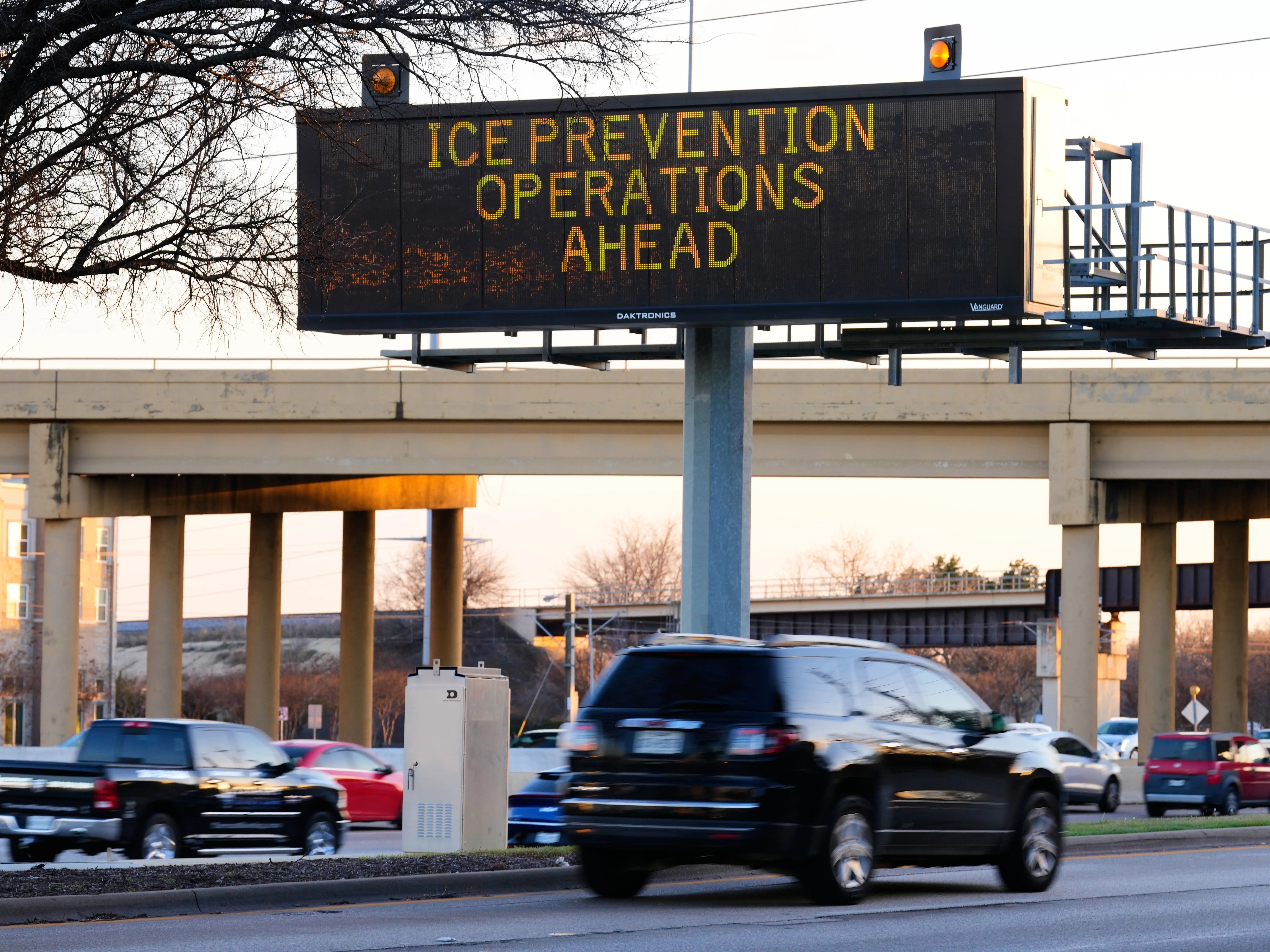 A digital billboard along Highway 75 warns of road preparations for upcoming inclement weather expected in the region Wednesday, Jan. 21, 2026, in Richardson, Texas.