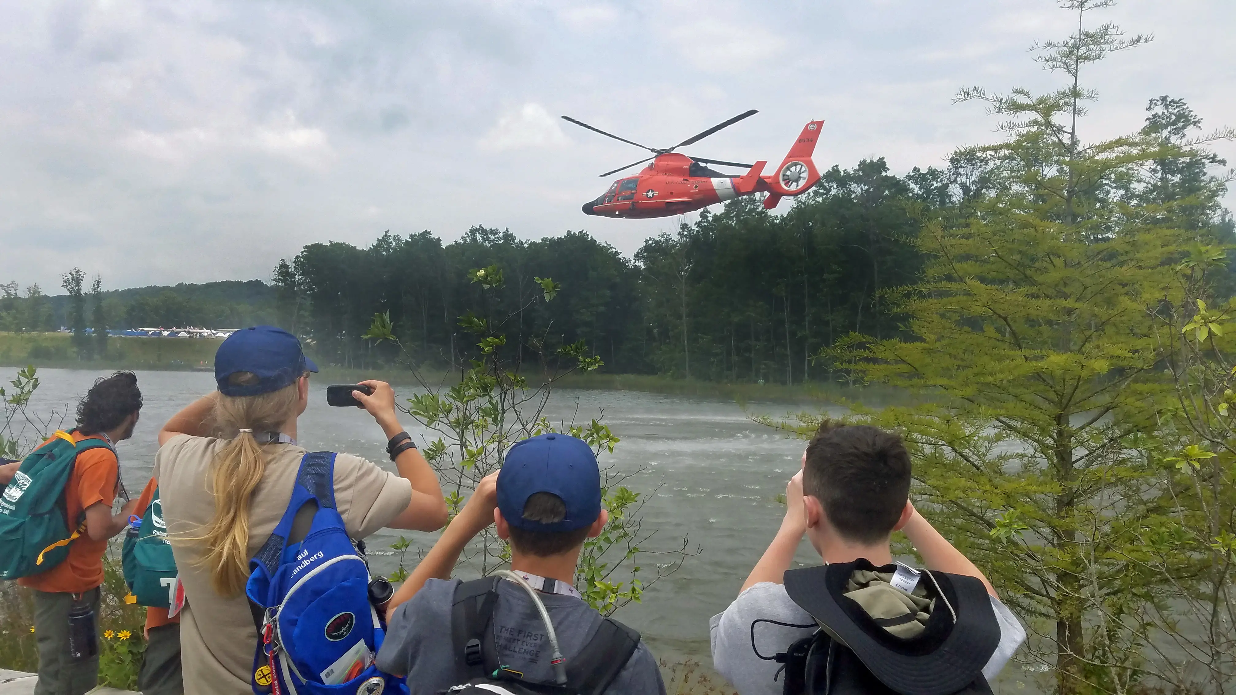 Scouts watch a simulated US Coast Guard rescue during the ten-day 2017 National Jamboree in West Virginia.